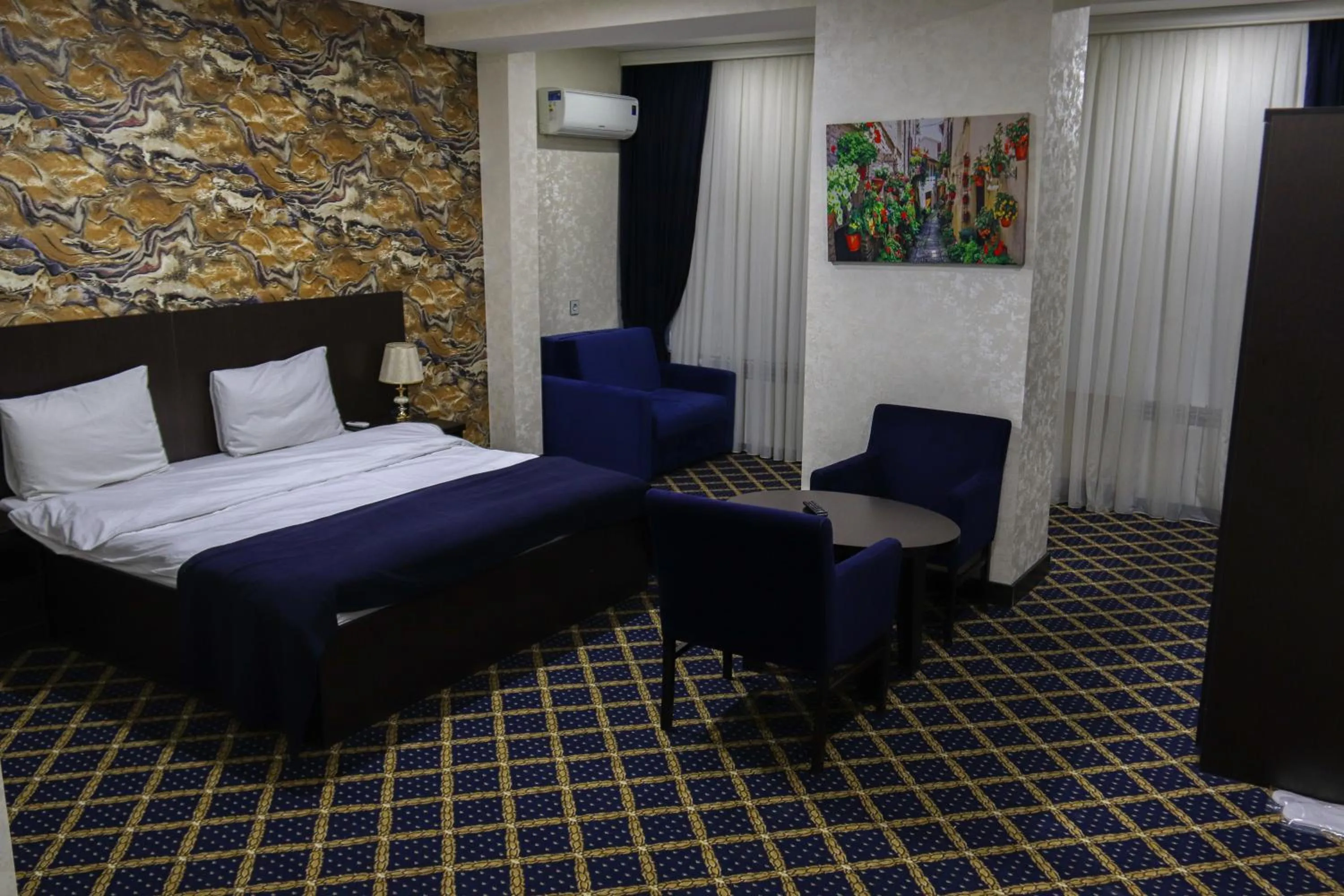 Bed in Kristal Inn Hotel