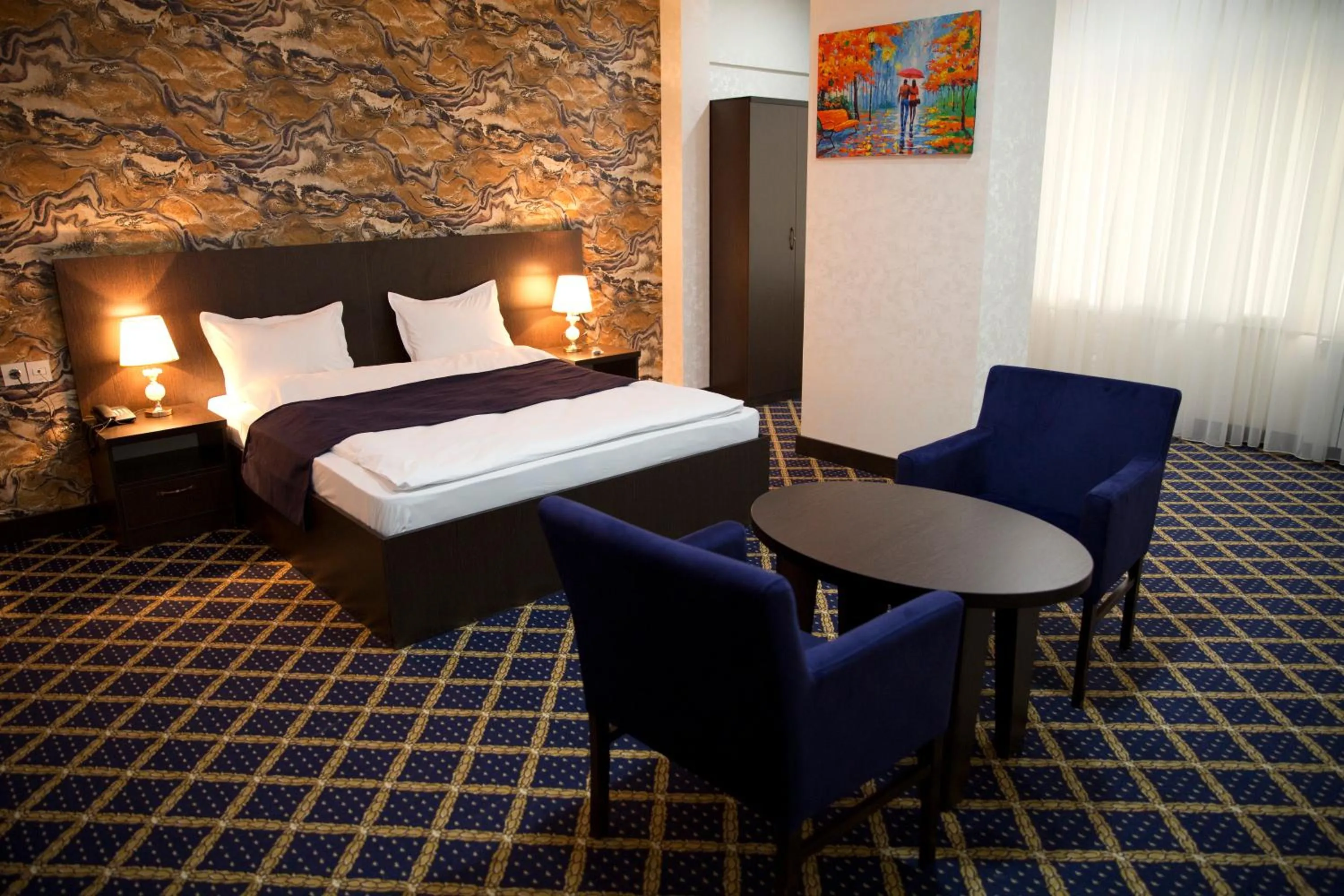 Bed in Kristal Inn Hotel
