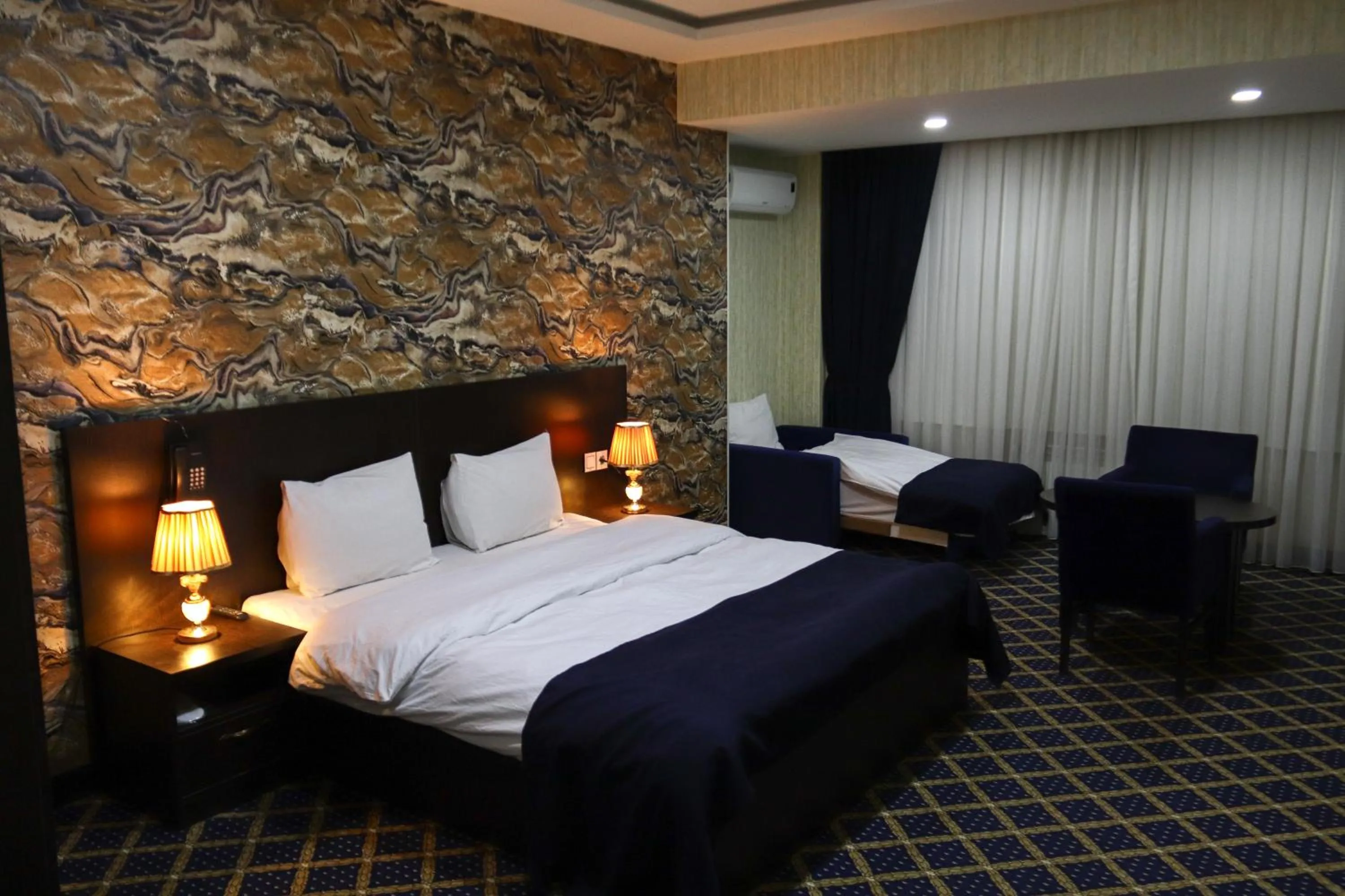 Photo of the whole room, Bed in Kristal Inn Hotel