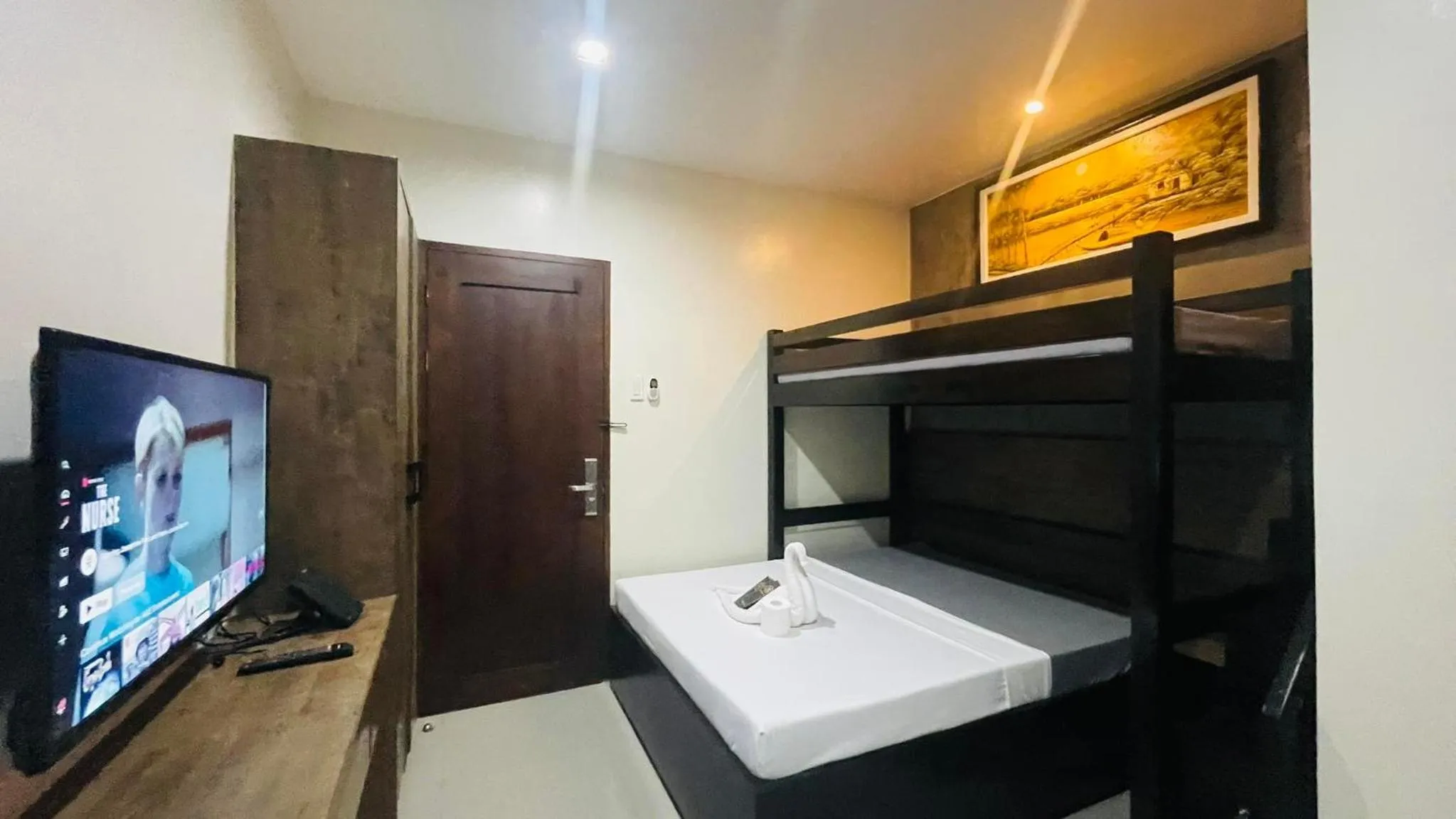 Bed in A&E Apartelle