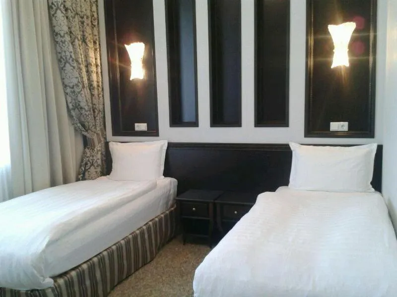 Bed in Royal Petrol Hotel