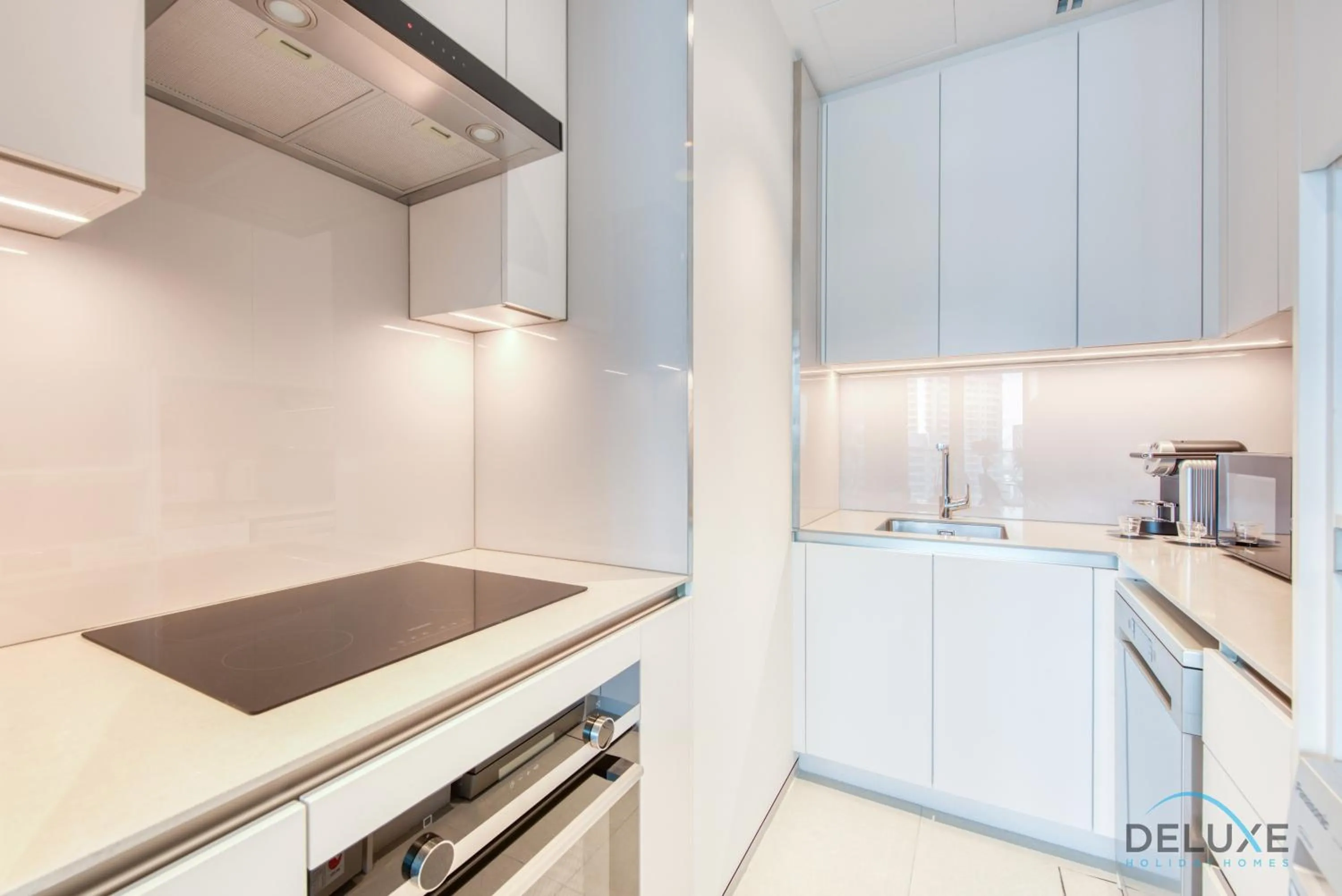 Kitchen or kitchenette in Exquisite 1BR at The Address Residences in JBR by Deluxe Holiday Homes