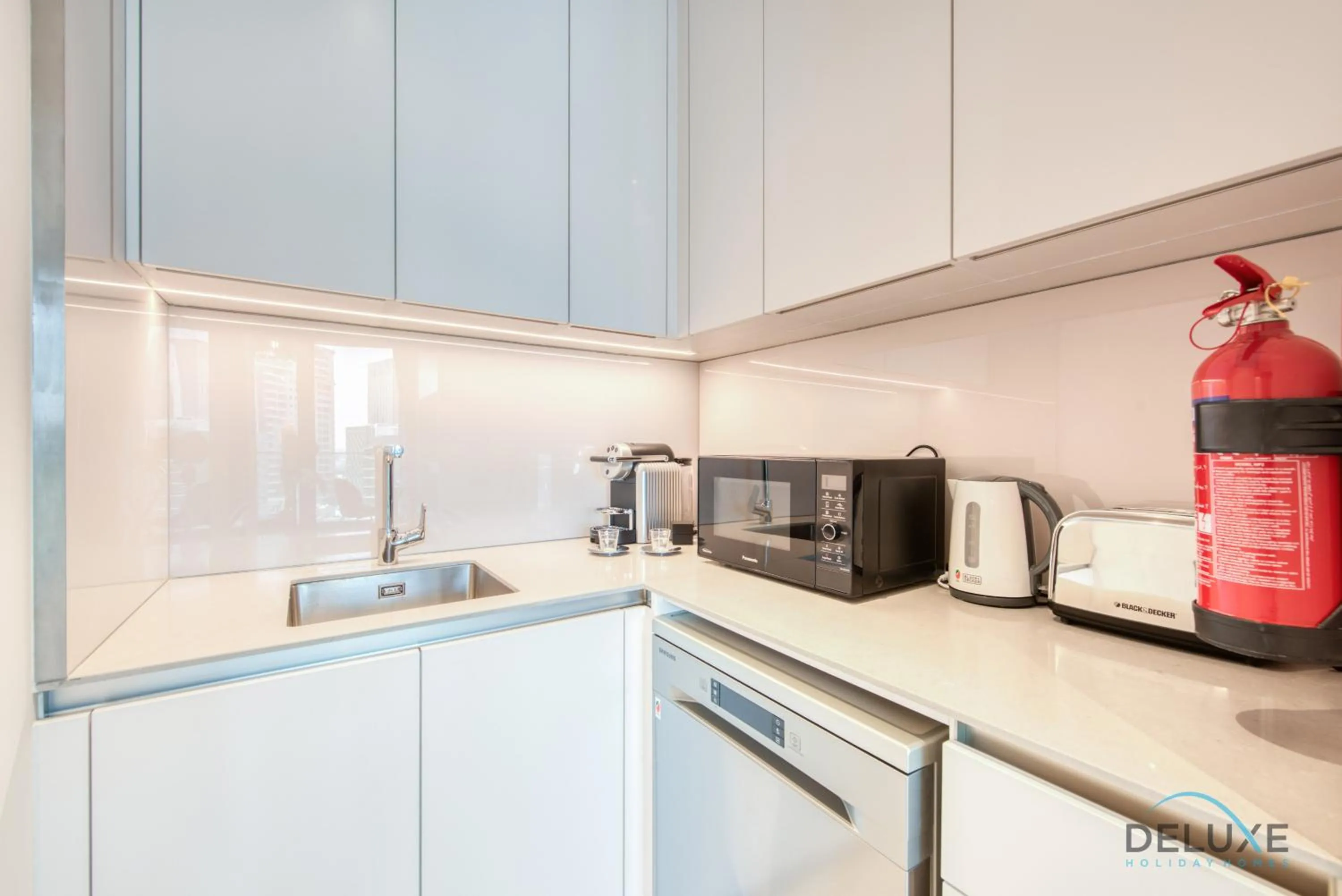 Kitchen or kitchenette in Exquisite 1BR at The Address Residences in JBR by Deluxe Holiday Homes