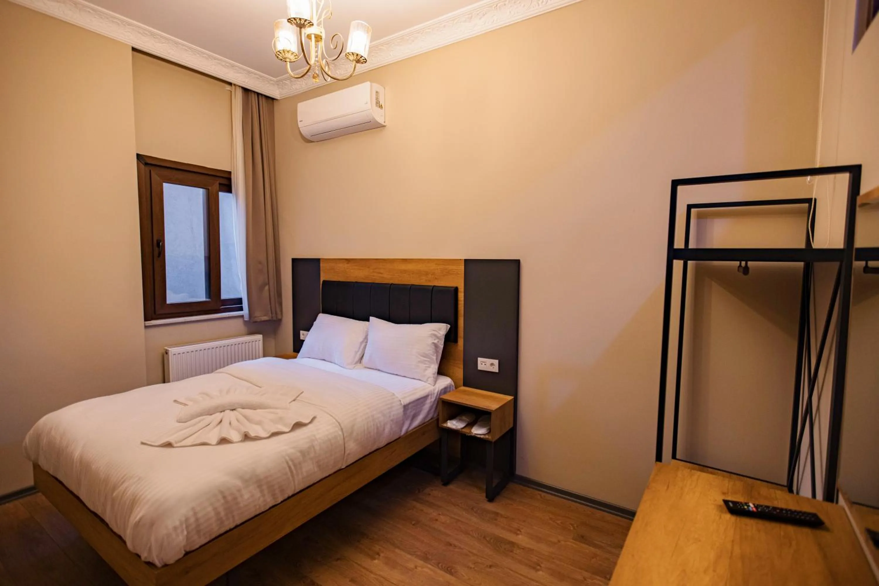 Bed in Grand Balyan Hotel & Restaurant