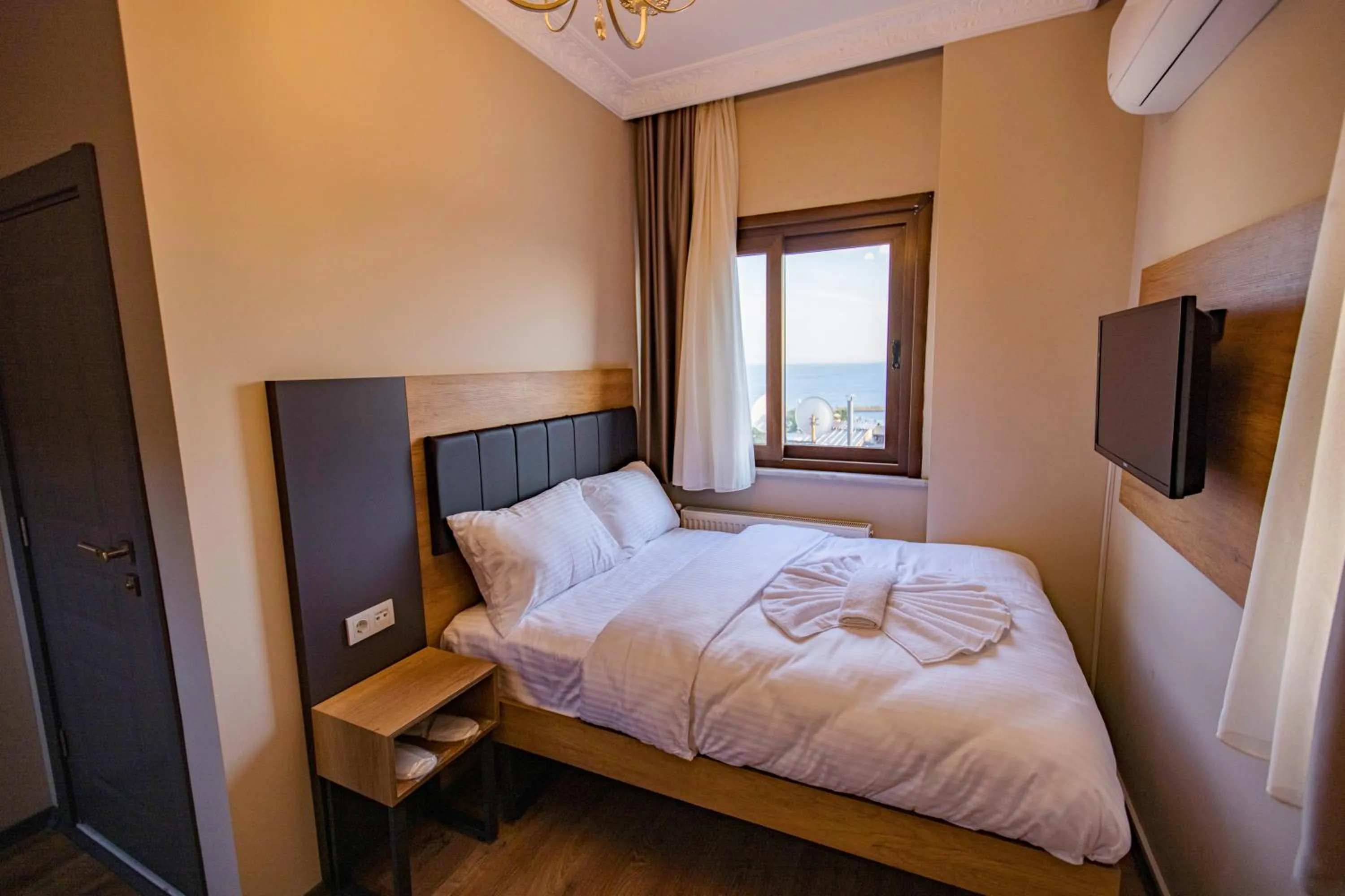 Bed in Grand Balyan Hotel & Restaurant