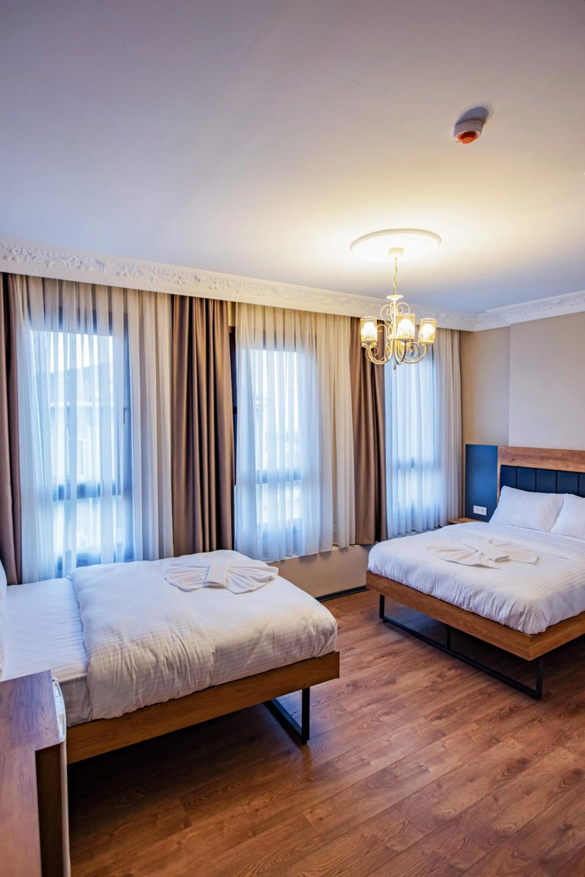 Bed in Grand Balyan Hotel & Restaurant