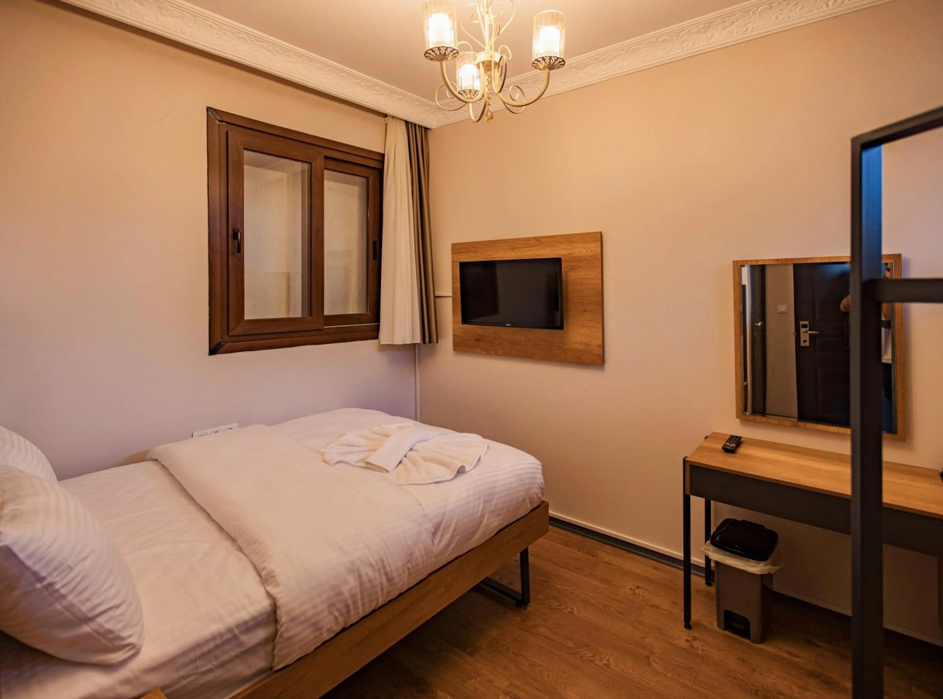 Bed in Grand Balyan Hotel & Restaurant