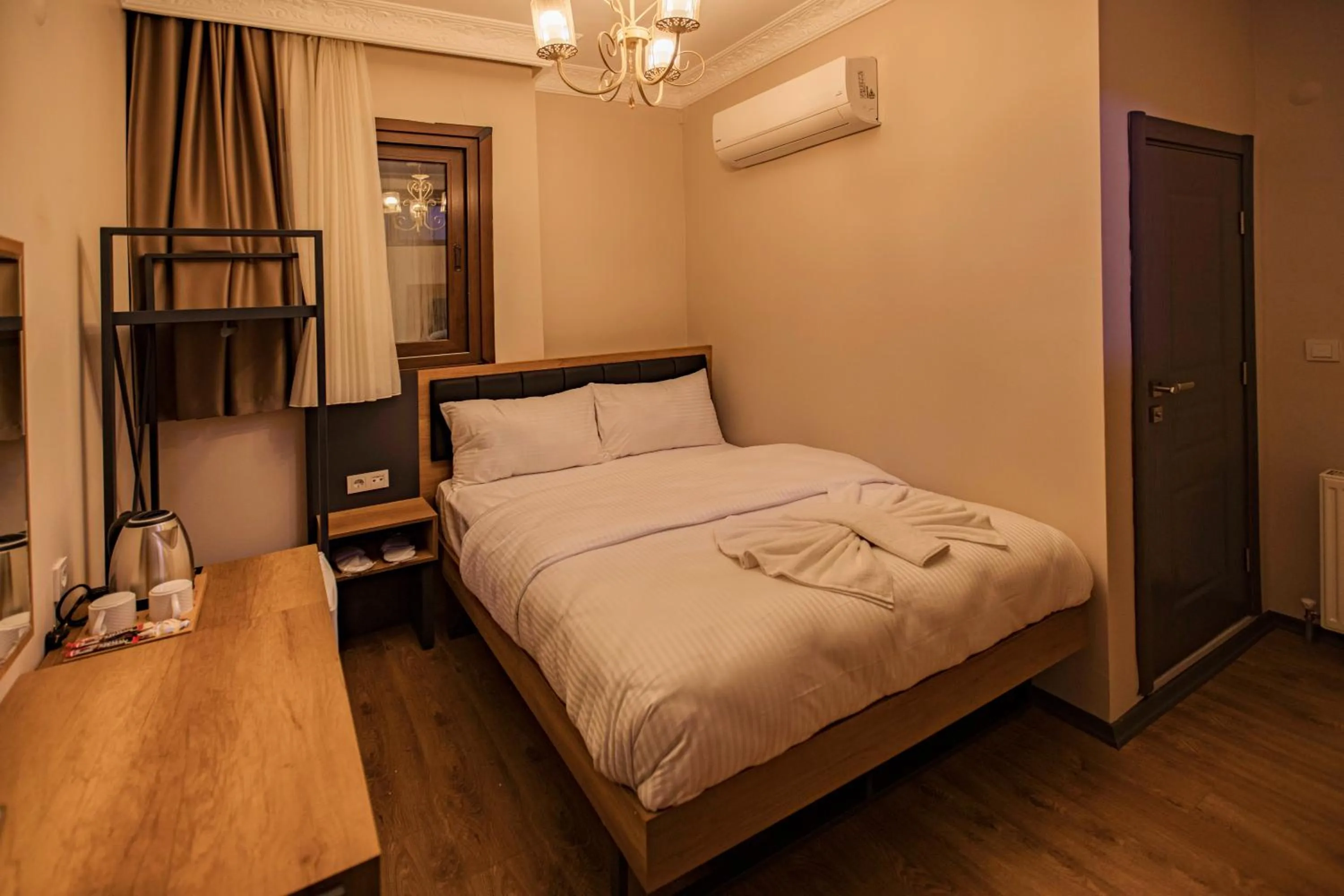 Photo of the whole room, Bed in Grand Balyan Hotel & Restaurant