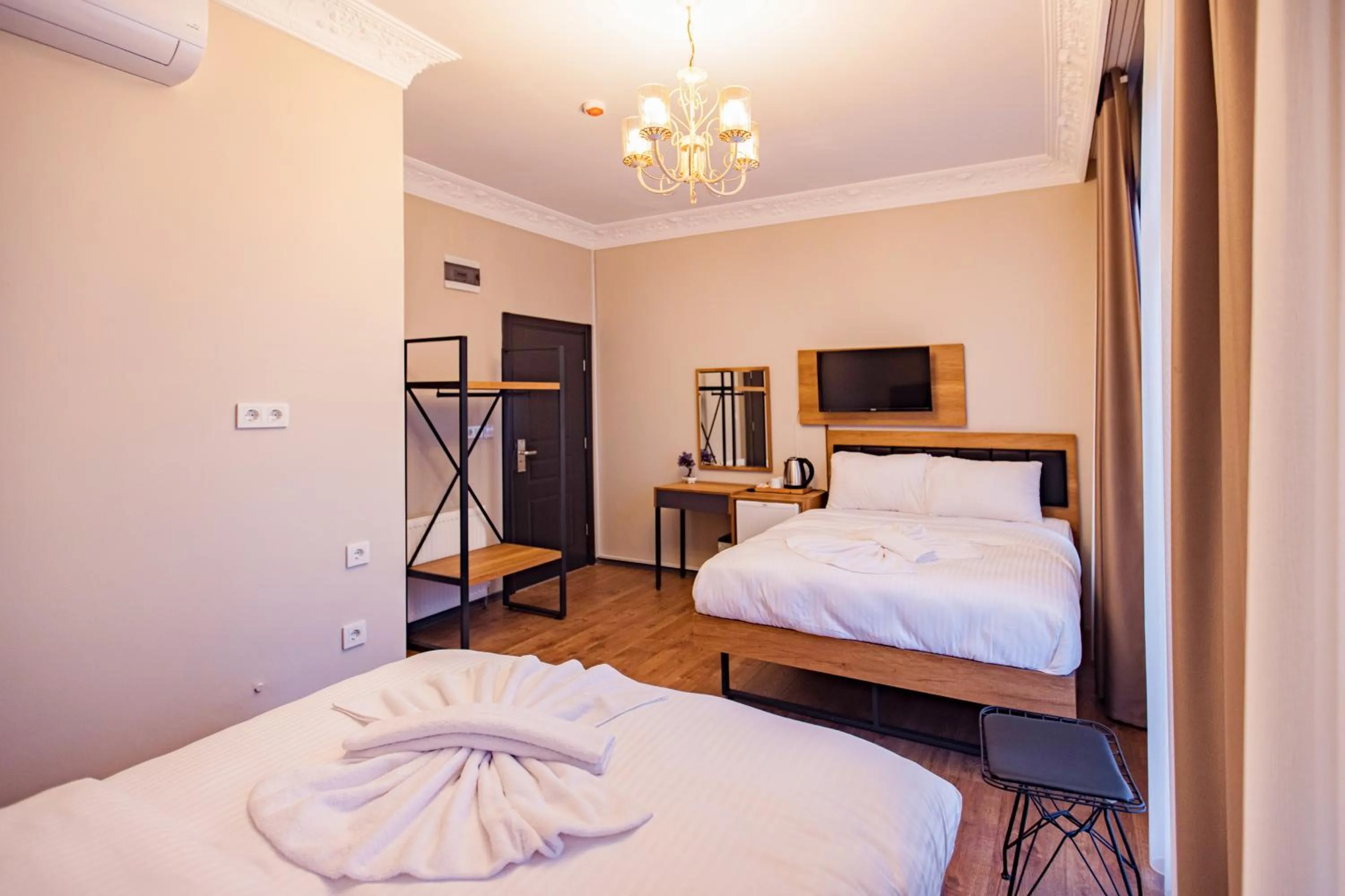 Bed in Grand Balyan Hotel & Restaurant