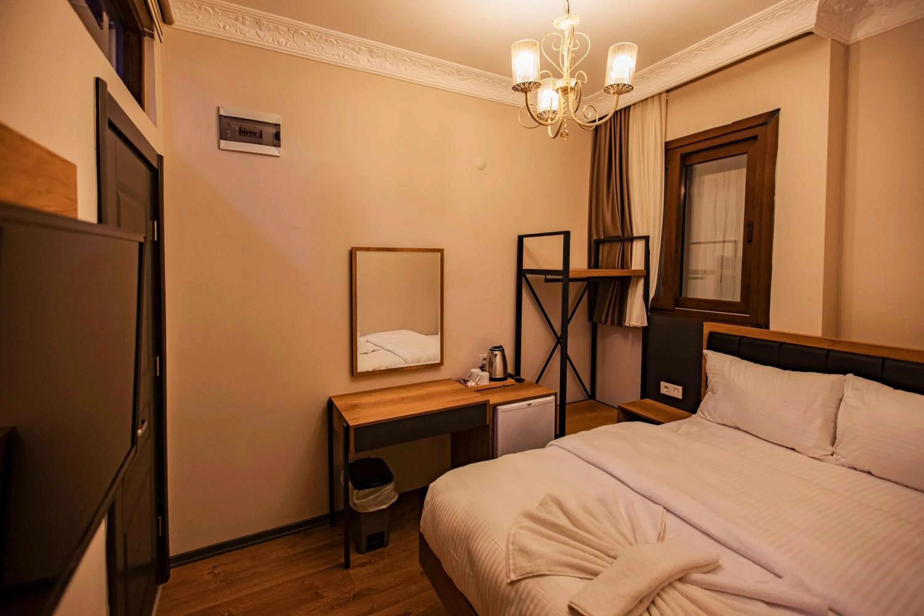 Bed in Grand Balyan Hotel & Restaurant