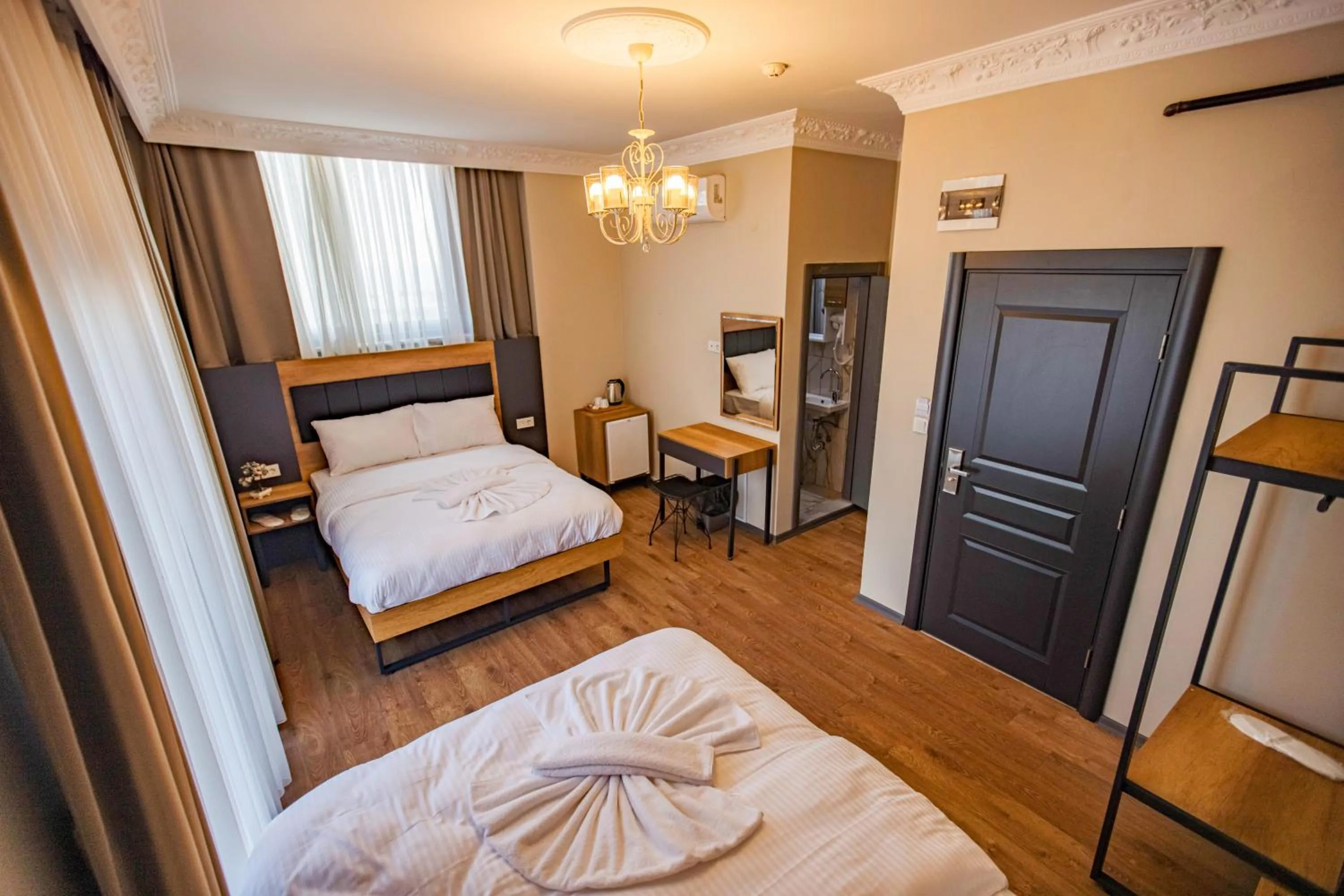 Bed in Grand Balyan Hotel & Restaurant