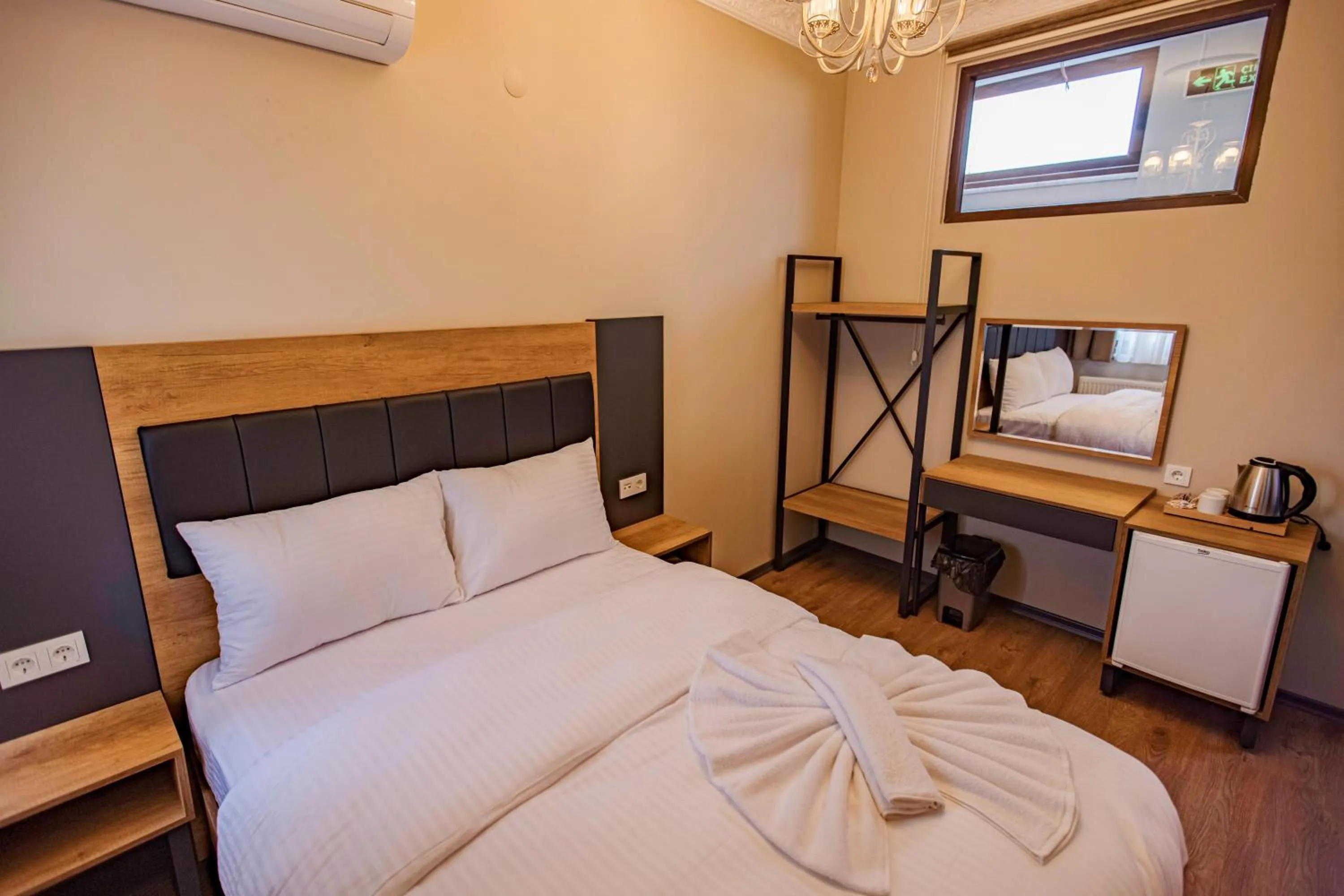 Bed in Grand Balyan Hotel & Restaurant