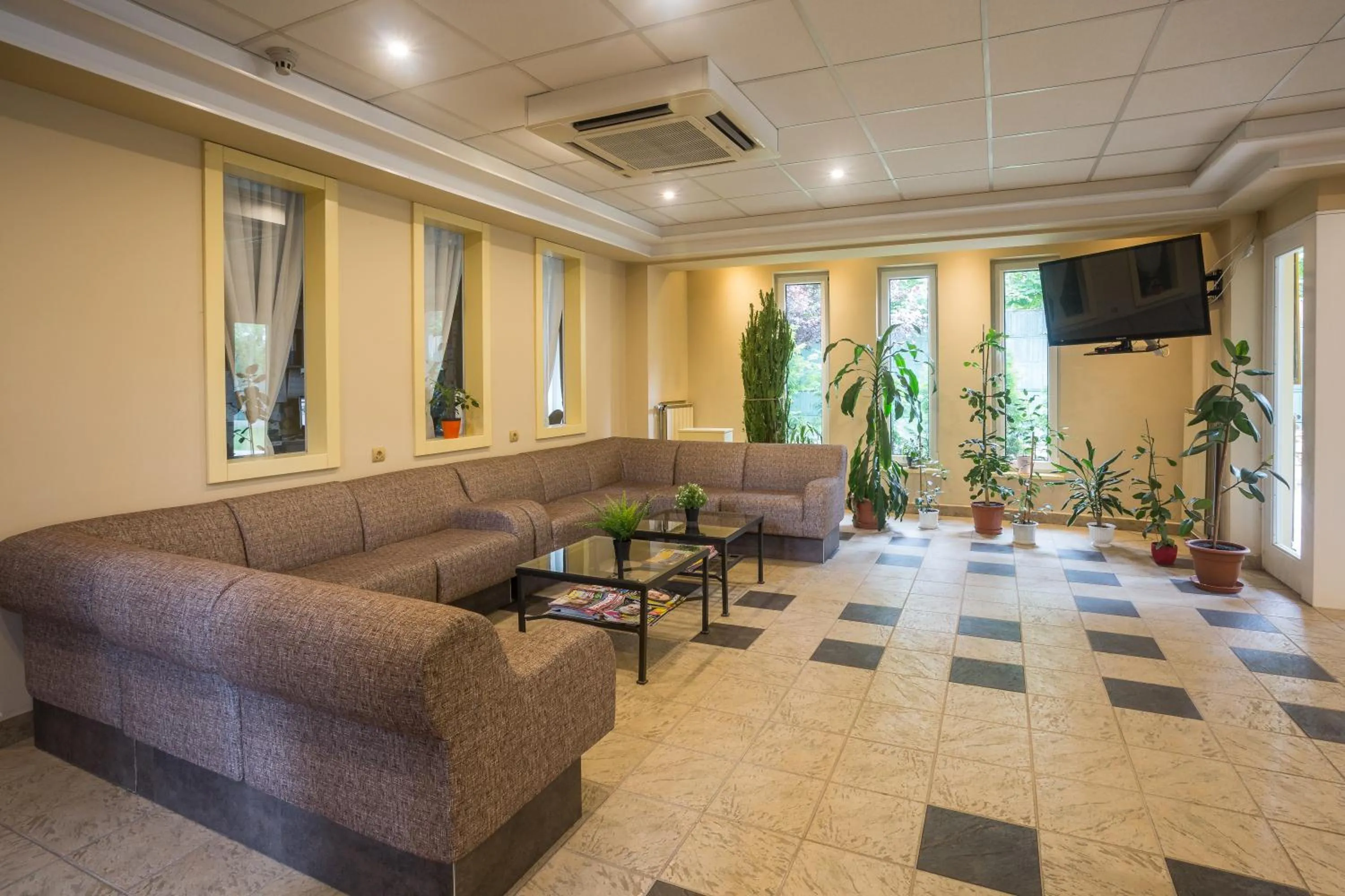 Communal lounge/ TV room in Hotel Luna Budapest