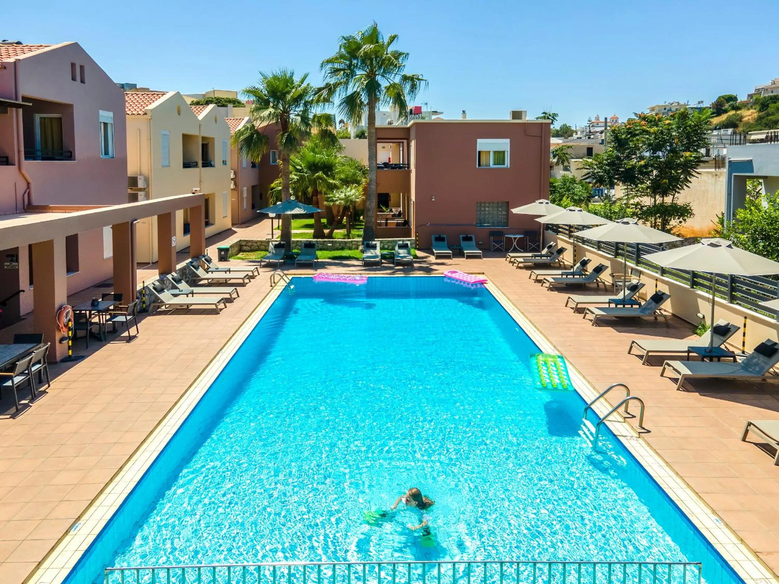 Swimming pool in Theos Holidays Apartments