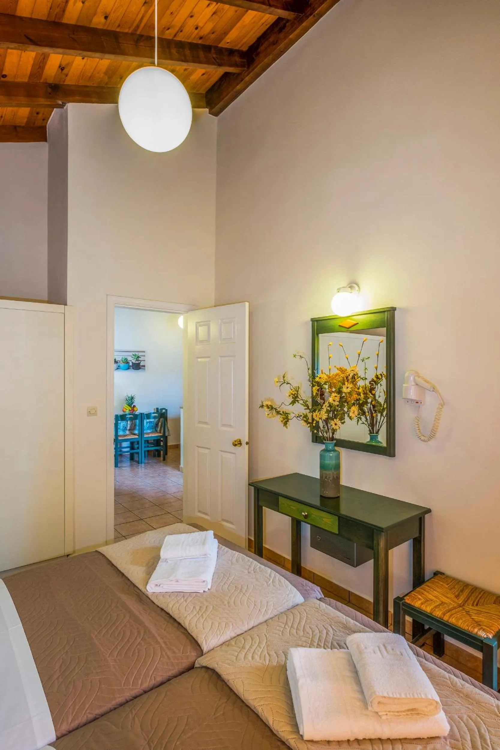 Bed in Theos Holidays Apartments