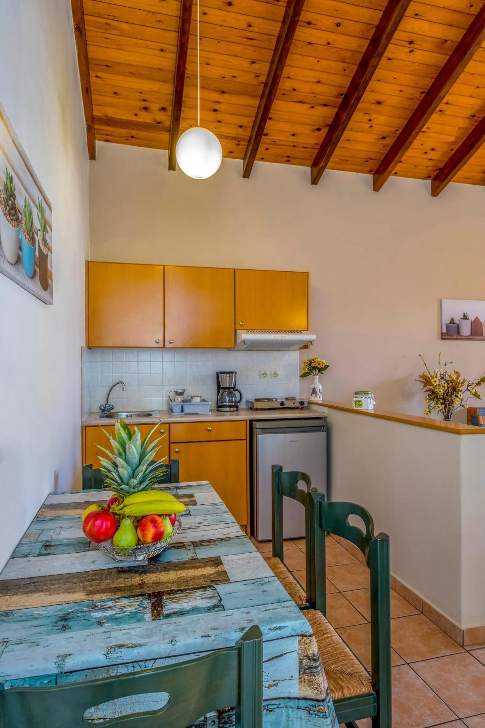 Kitchen or kitchenette in Theos Holidays Apartments