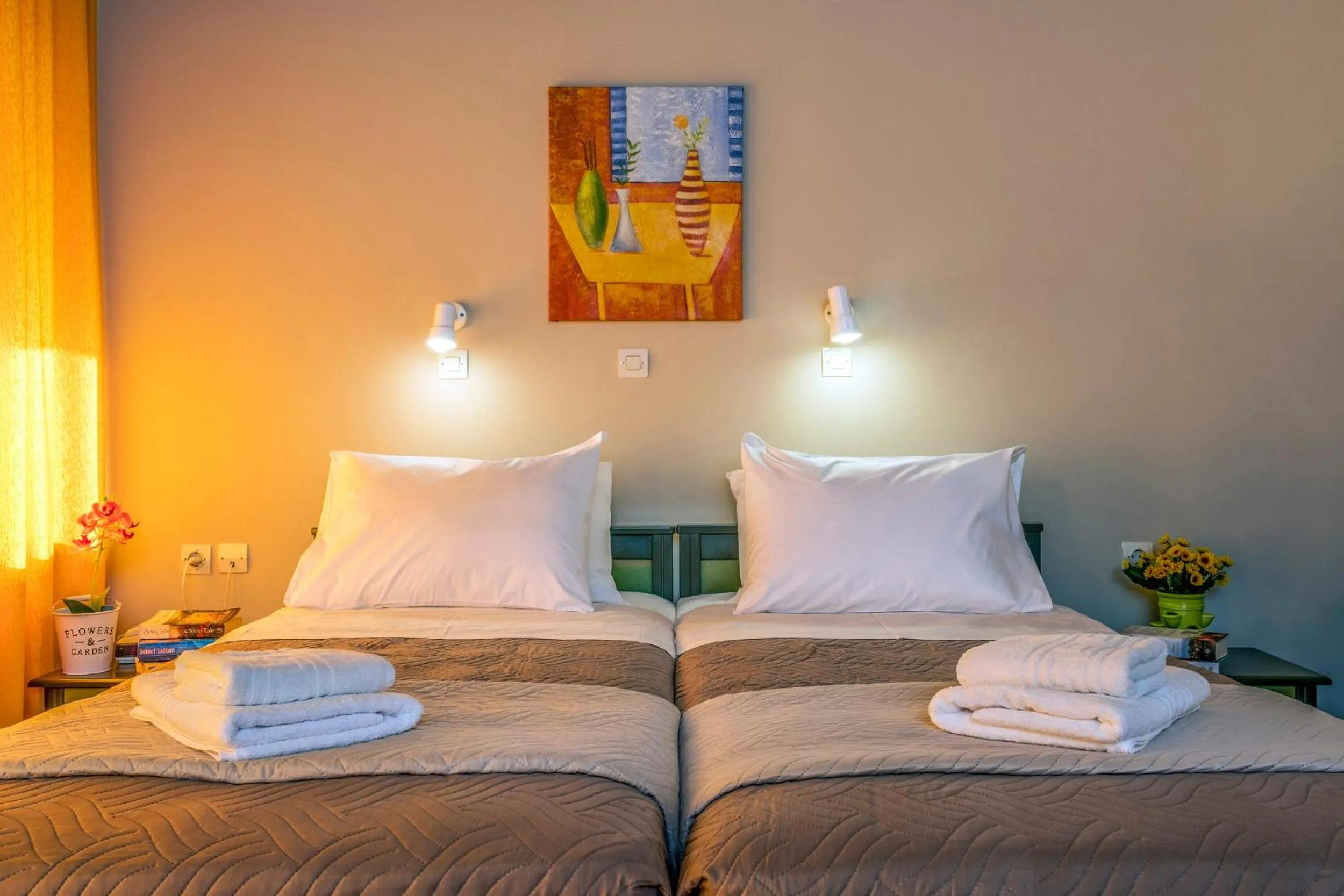 Bed in Theos Holidays Apartments