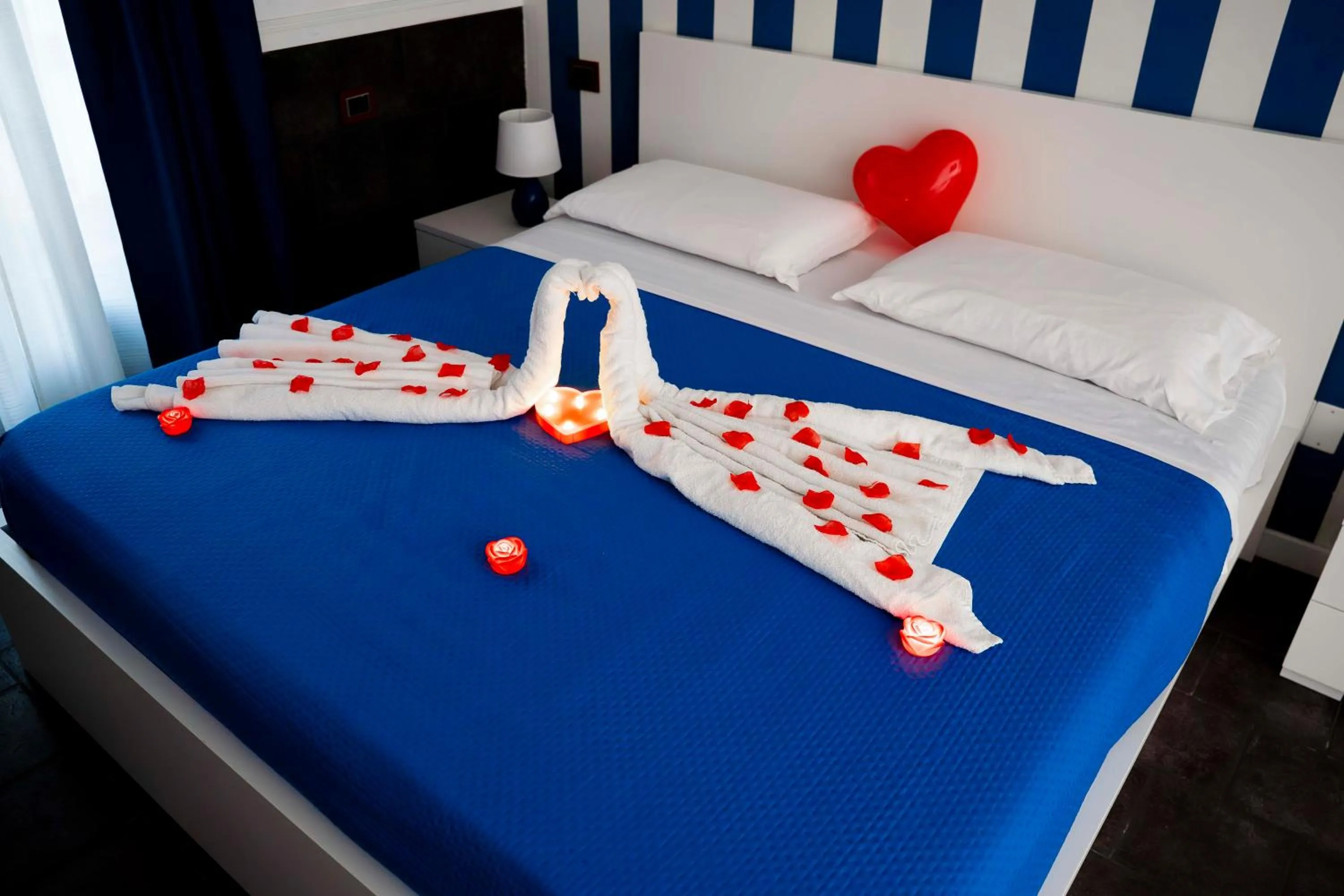 Decorative detail, Bed in Yacht Club Angioino