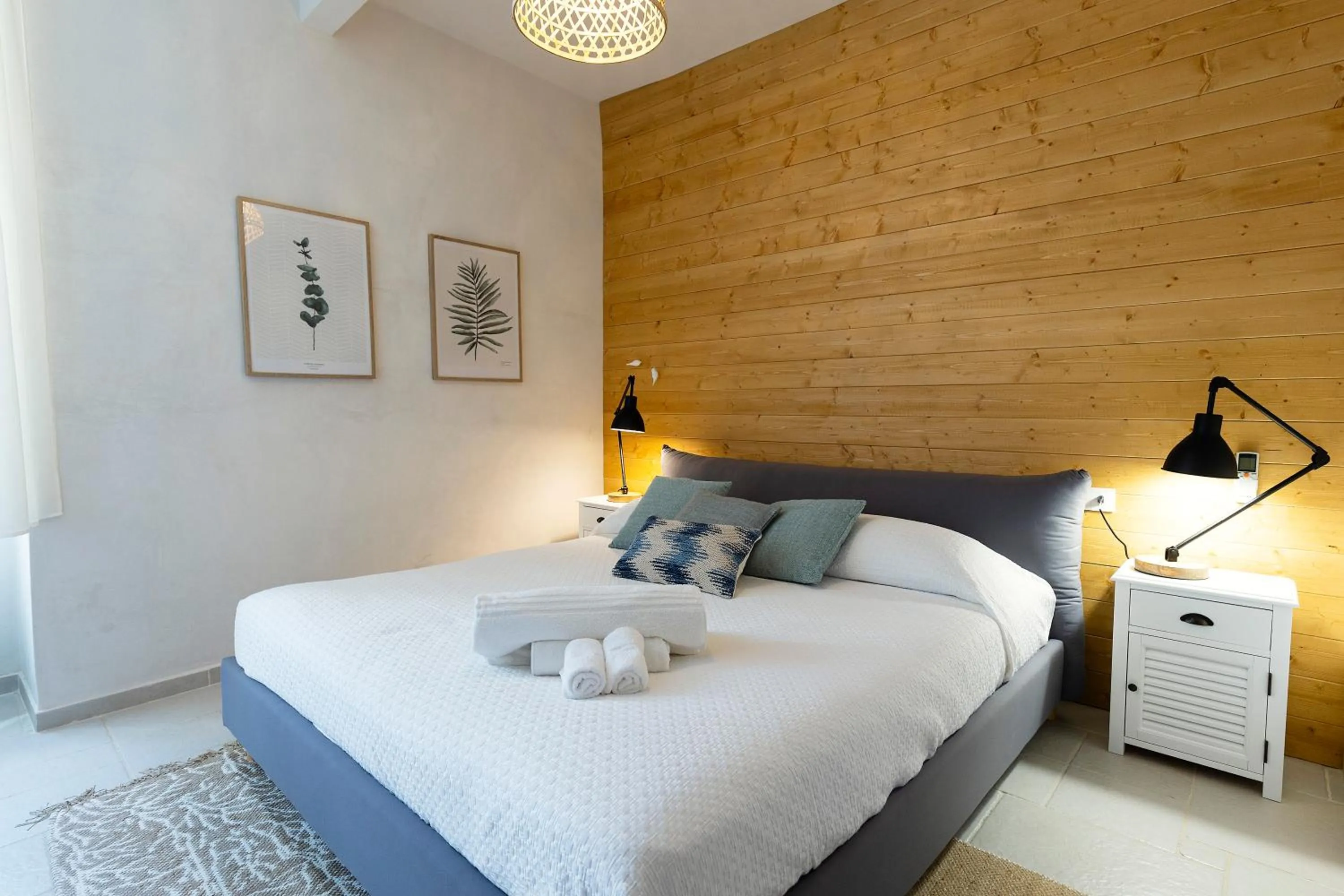 Bed in Palazzo Badiale history&rooms