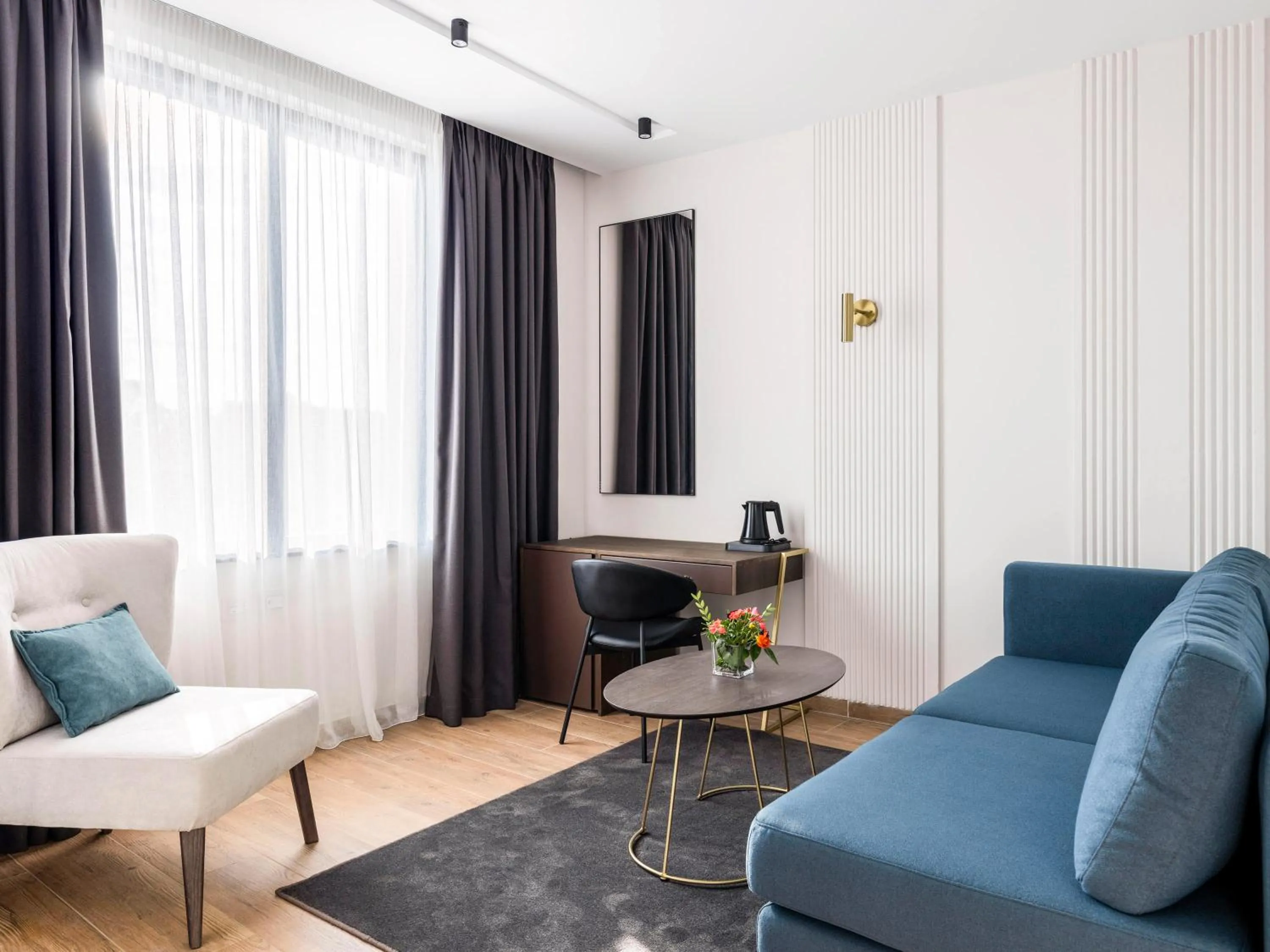 Living room, Bed in Mövenpick Hotel Lalez Durres