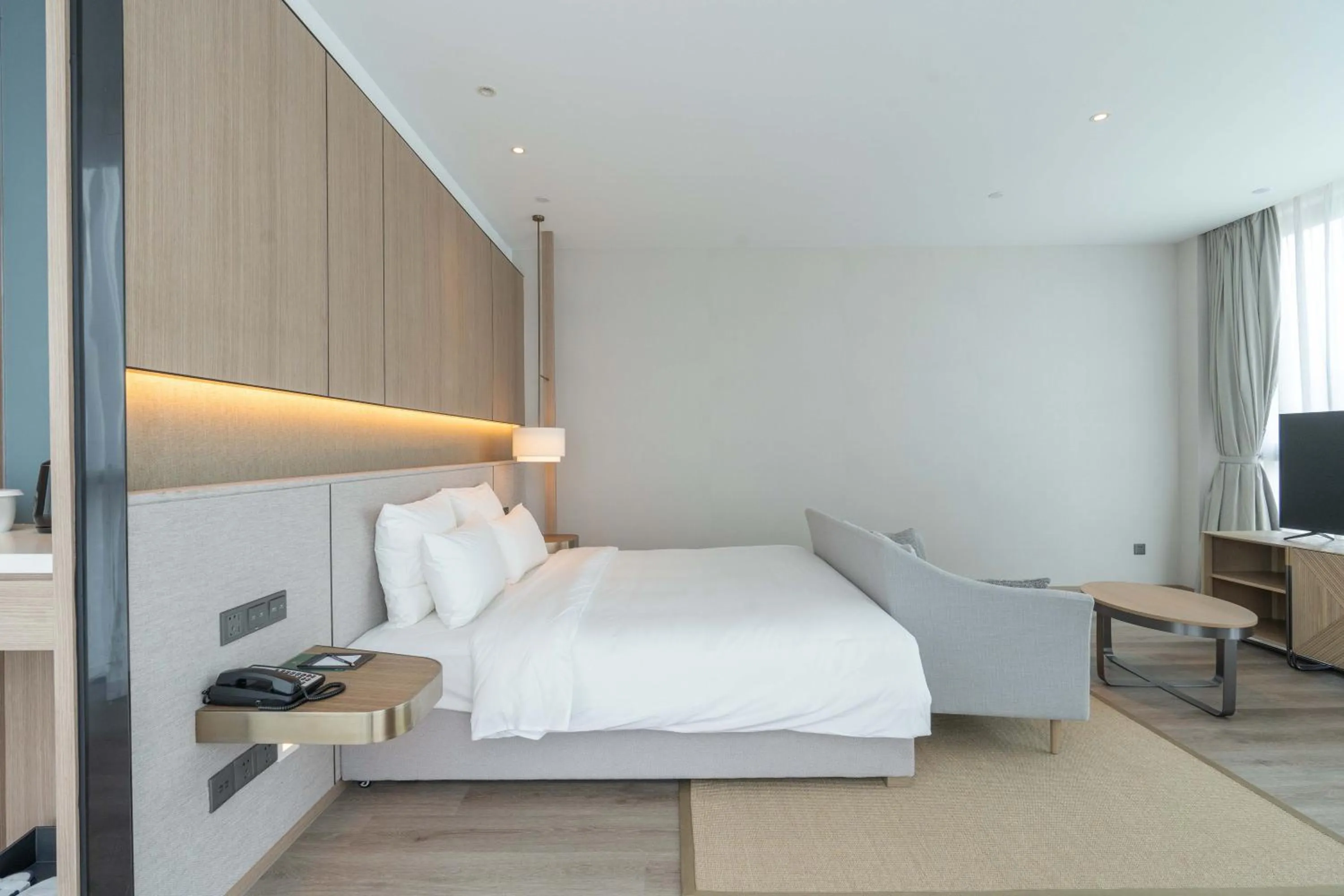 Bed in Novotel Shanghai Qingpu Excellence