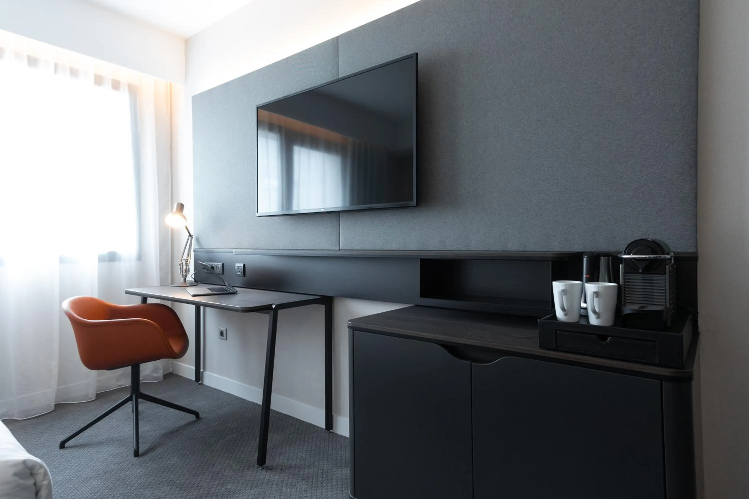 TV and multimedia in Holiday Inn Paris CDG Airport an IHG Hotel