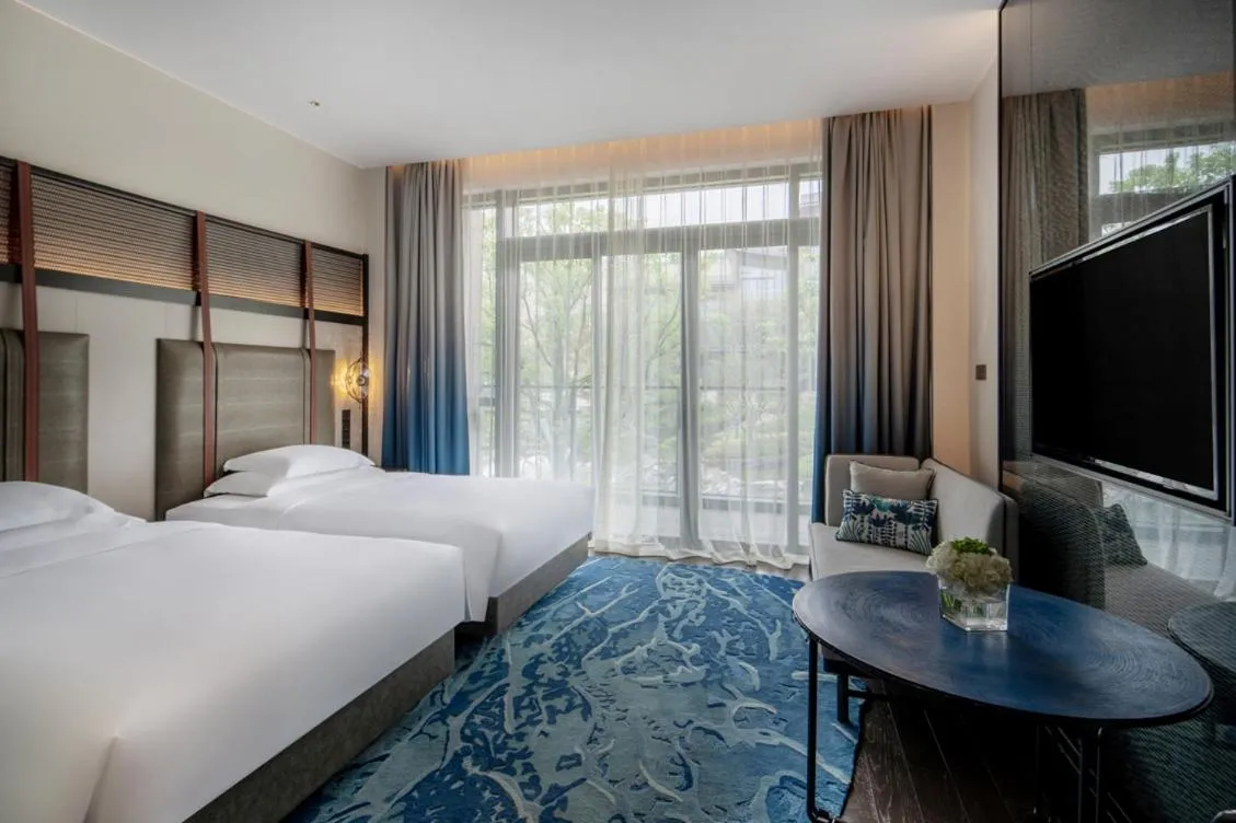 Bed in Hotel Indigo Nanjing Garden Expo, an IHG Hotel