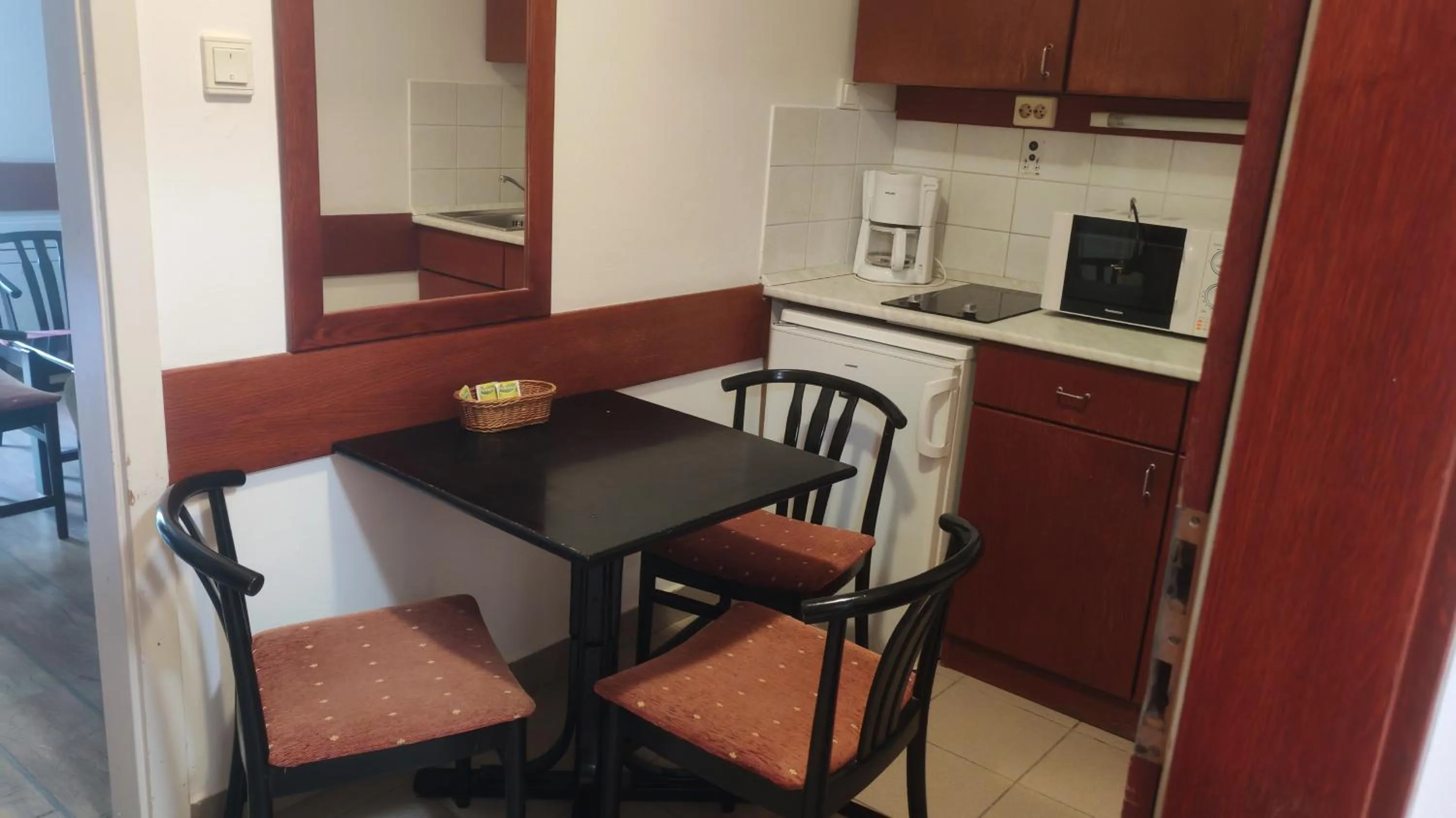 Kitchen or kitchenette in Abbázia Club Hotel Kék