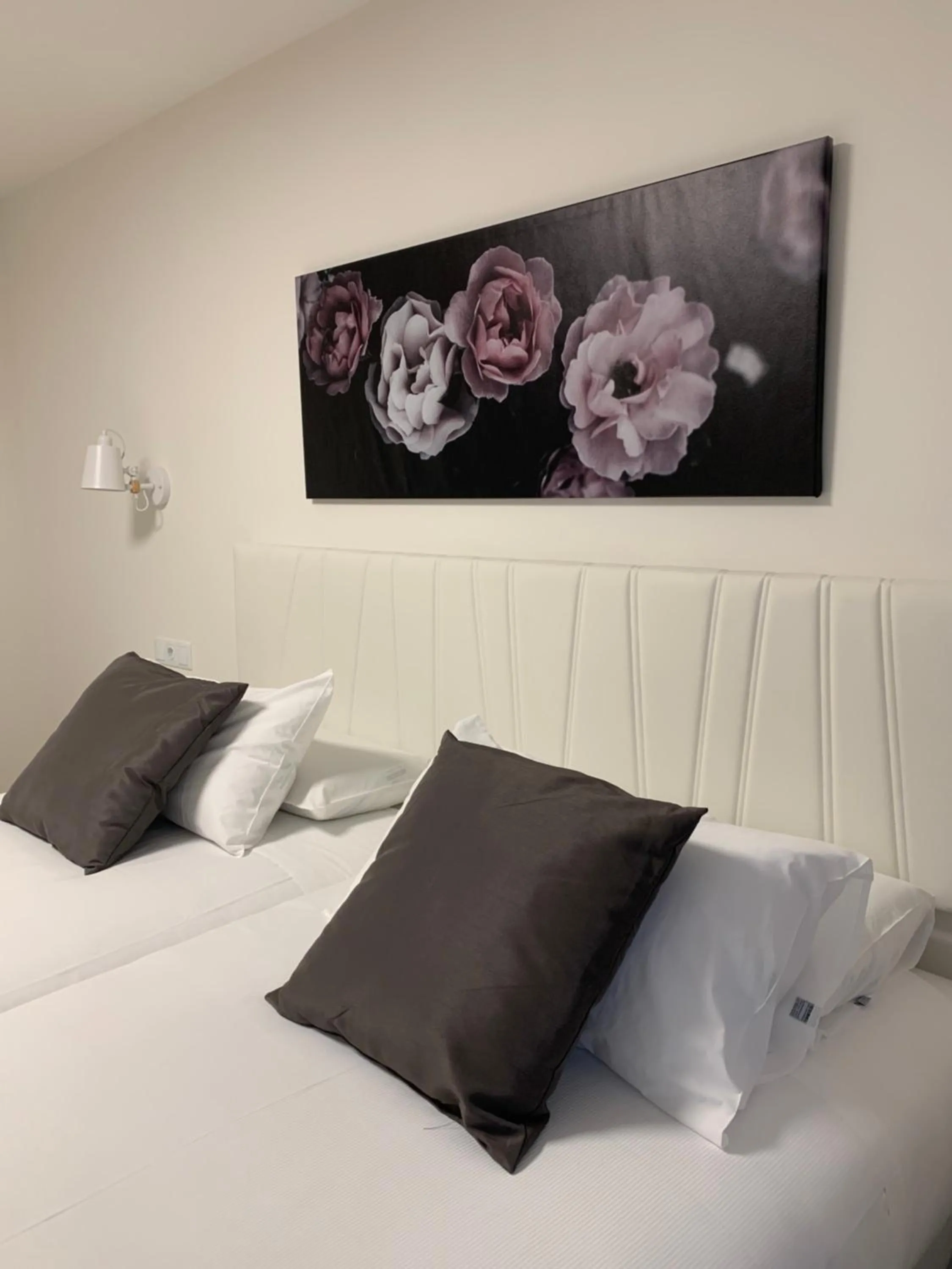 Bed in Hostal Comfort Suites