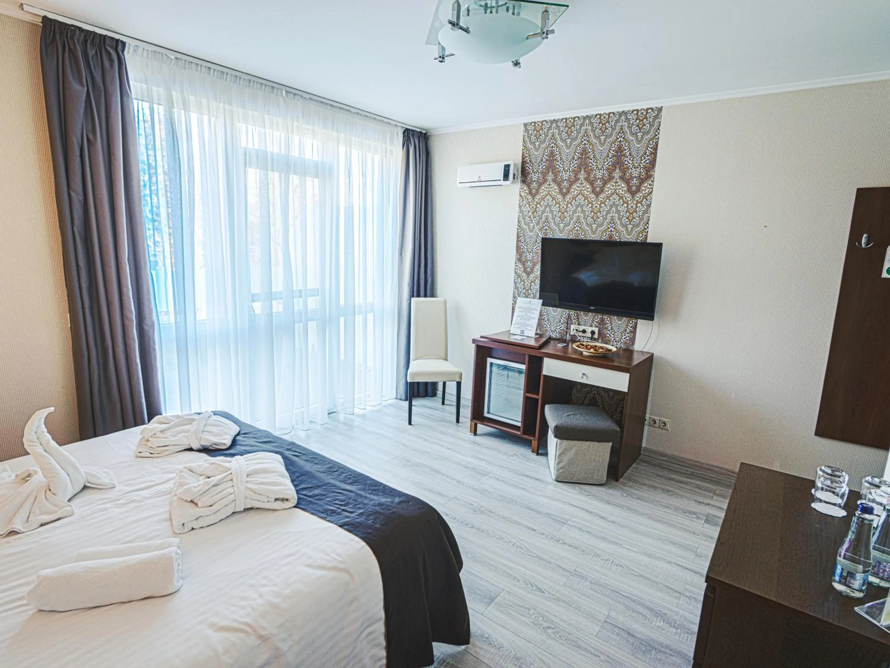 Photo of the whole room, Bed in Holiday Beach Budapest Hotel