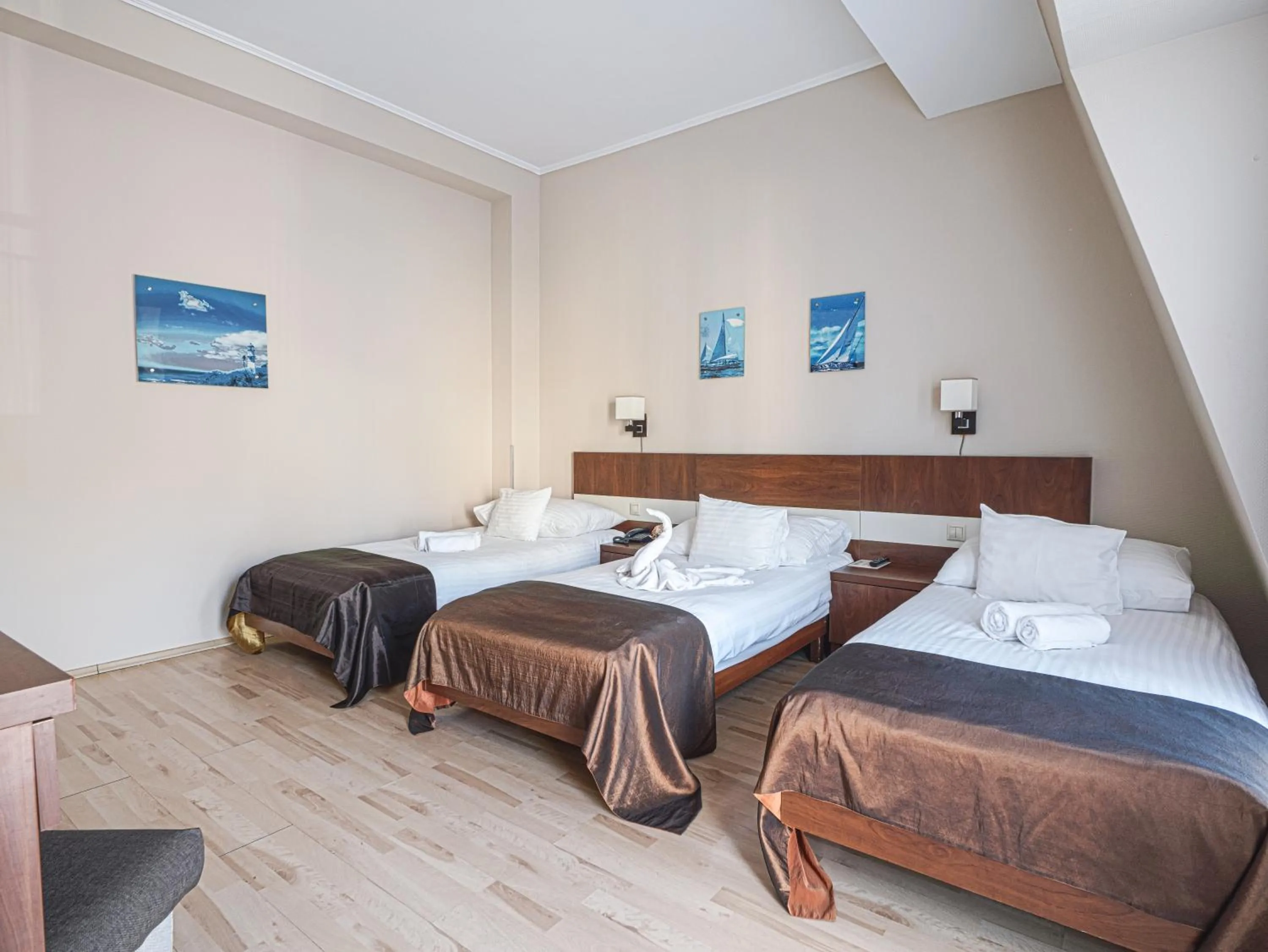 Bed in Holiday Beach Budapest Hotel