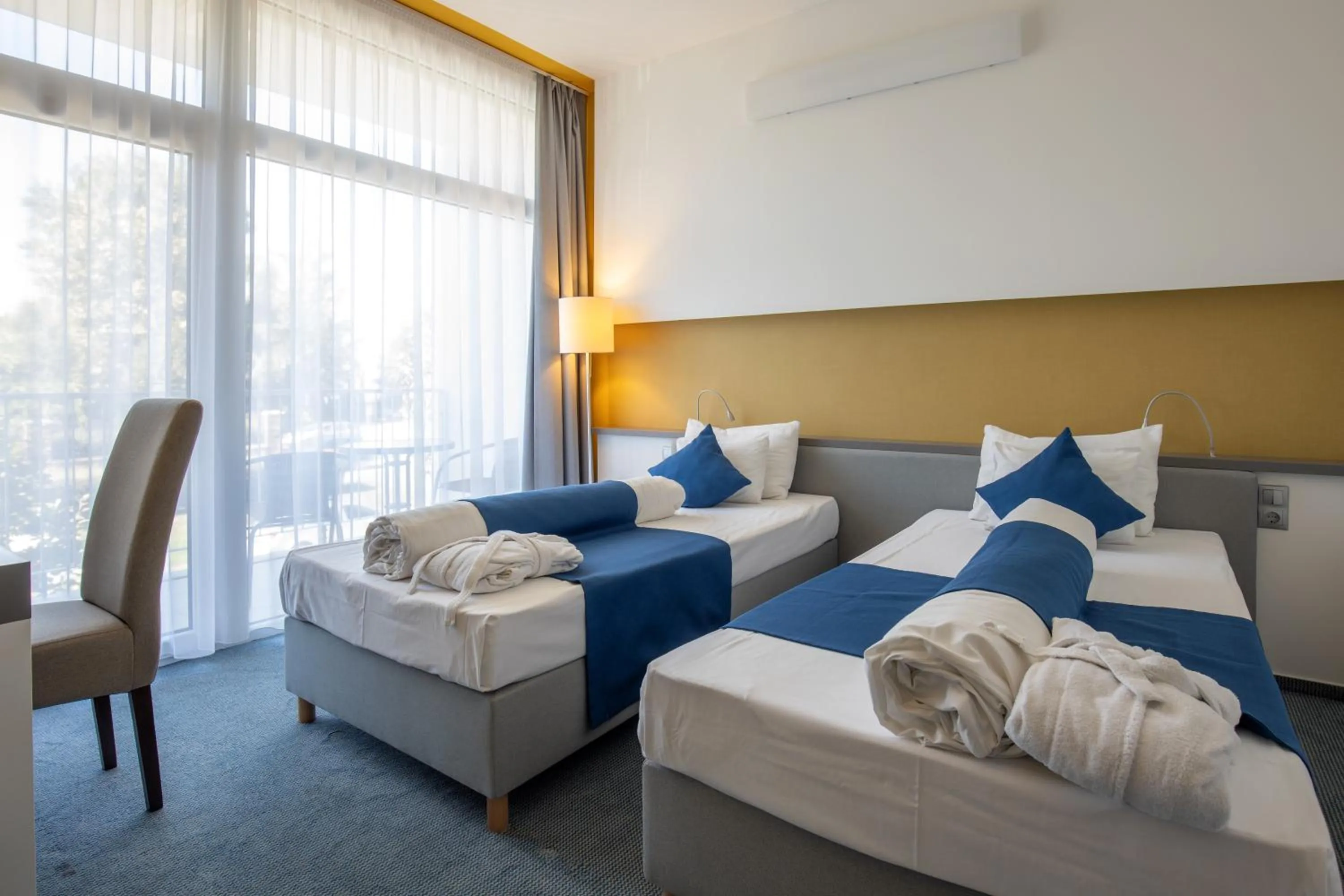 Bed in Hotel Yacht Wellness & Business