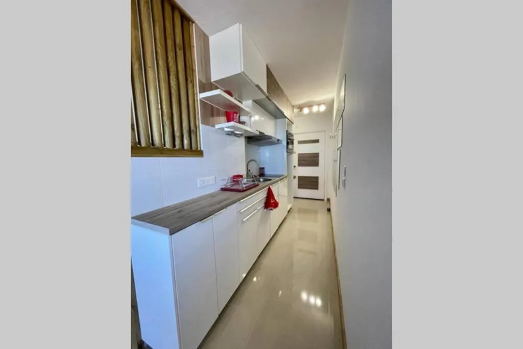 Kitchen or kitchenette in Superbe Studio Le pavois