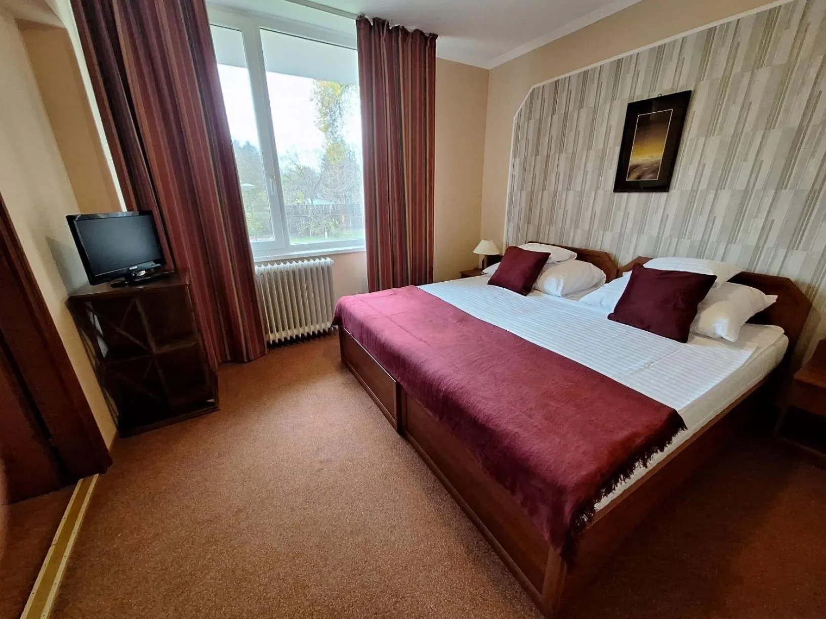 Photo of the whole room, Bed in Komfort Hotel Platan