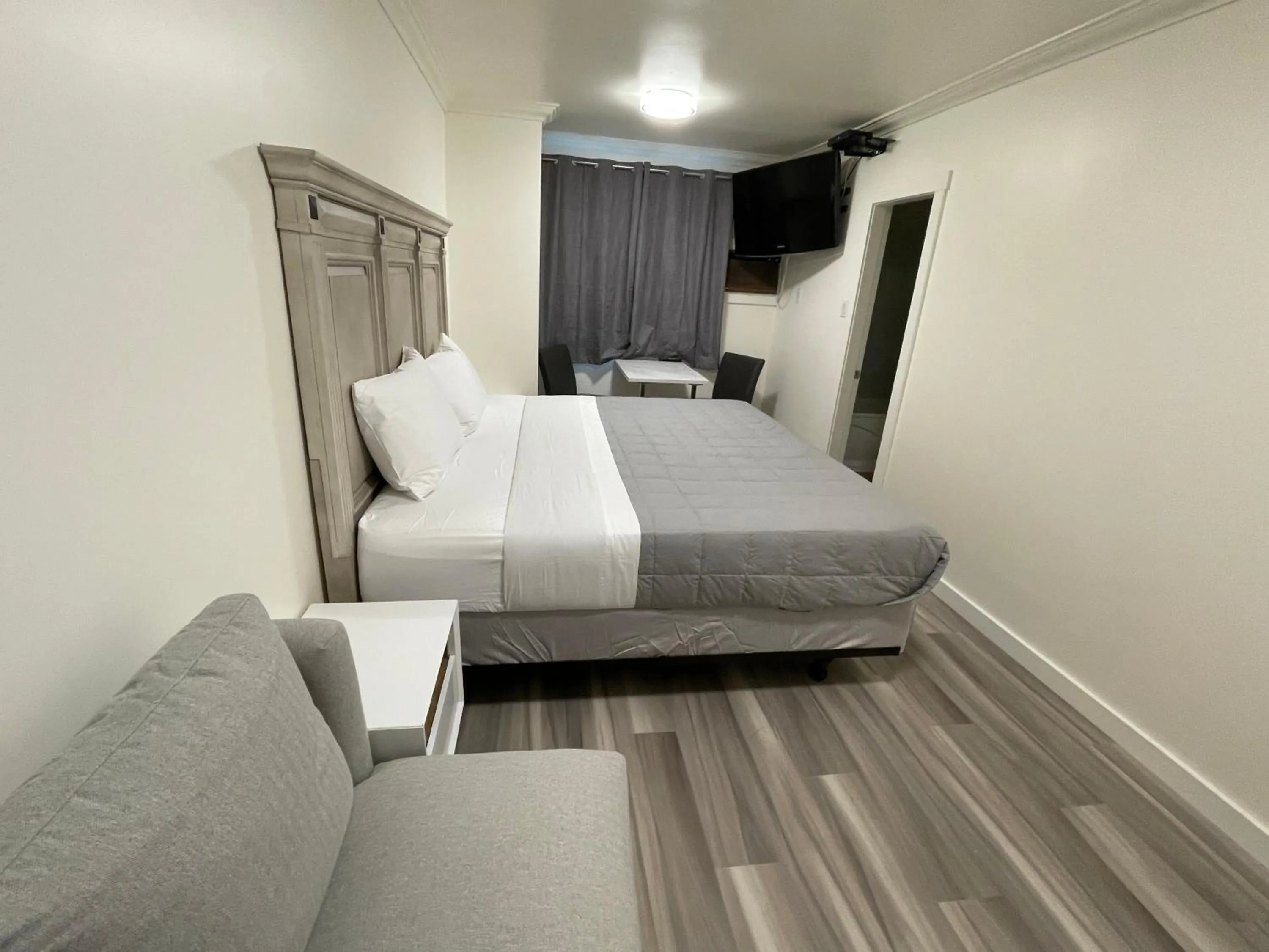 Photo of the whole room, Bed in Destination INN