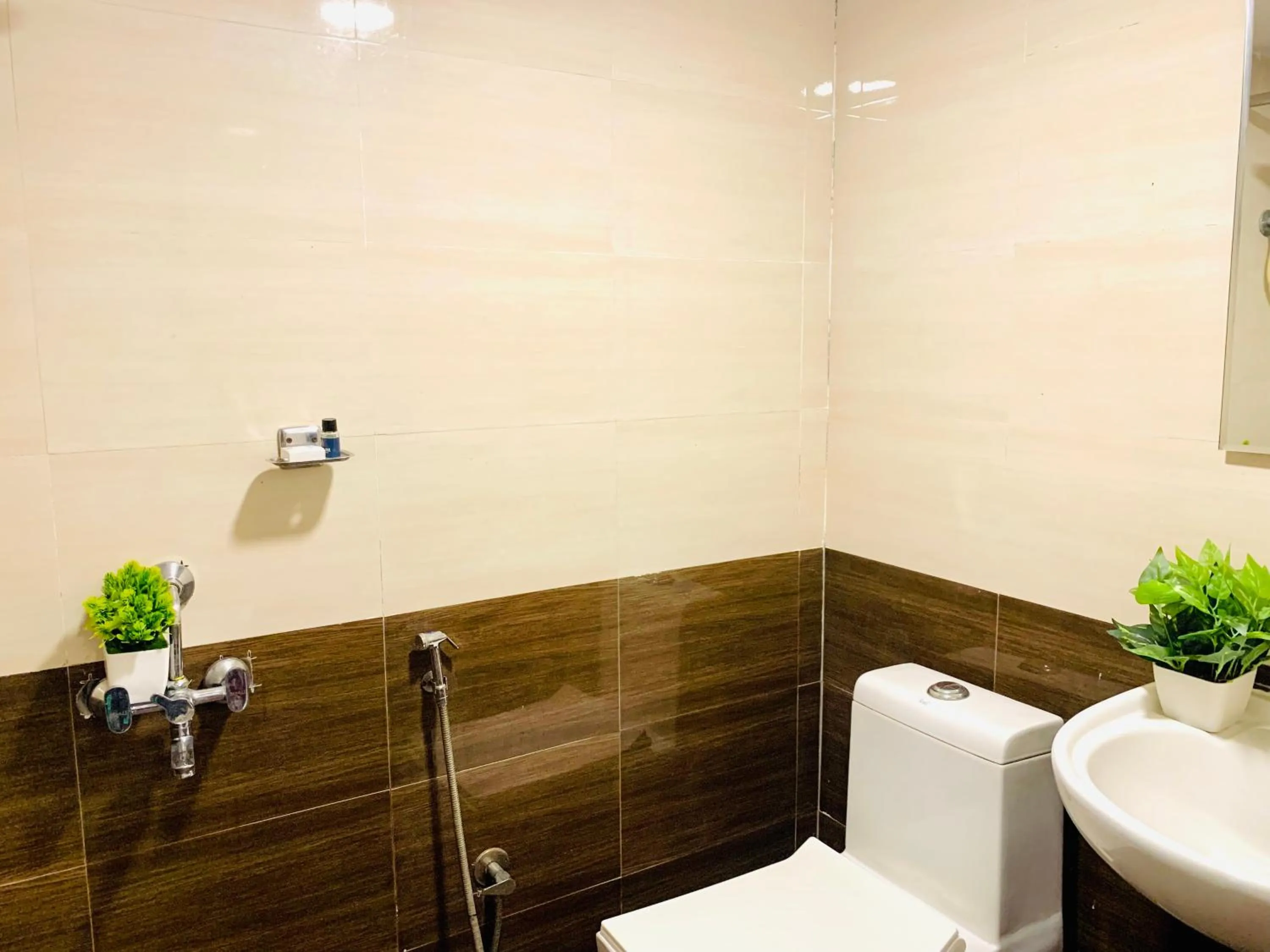 Bathroom in Hotel oak by signature airport zone hyderabad
