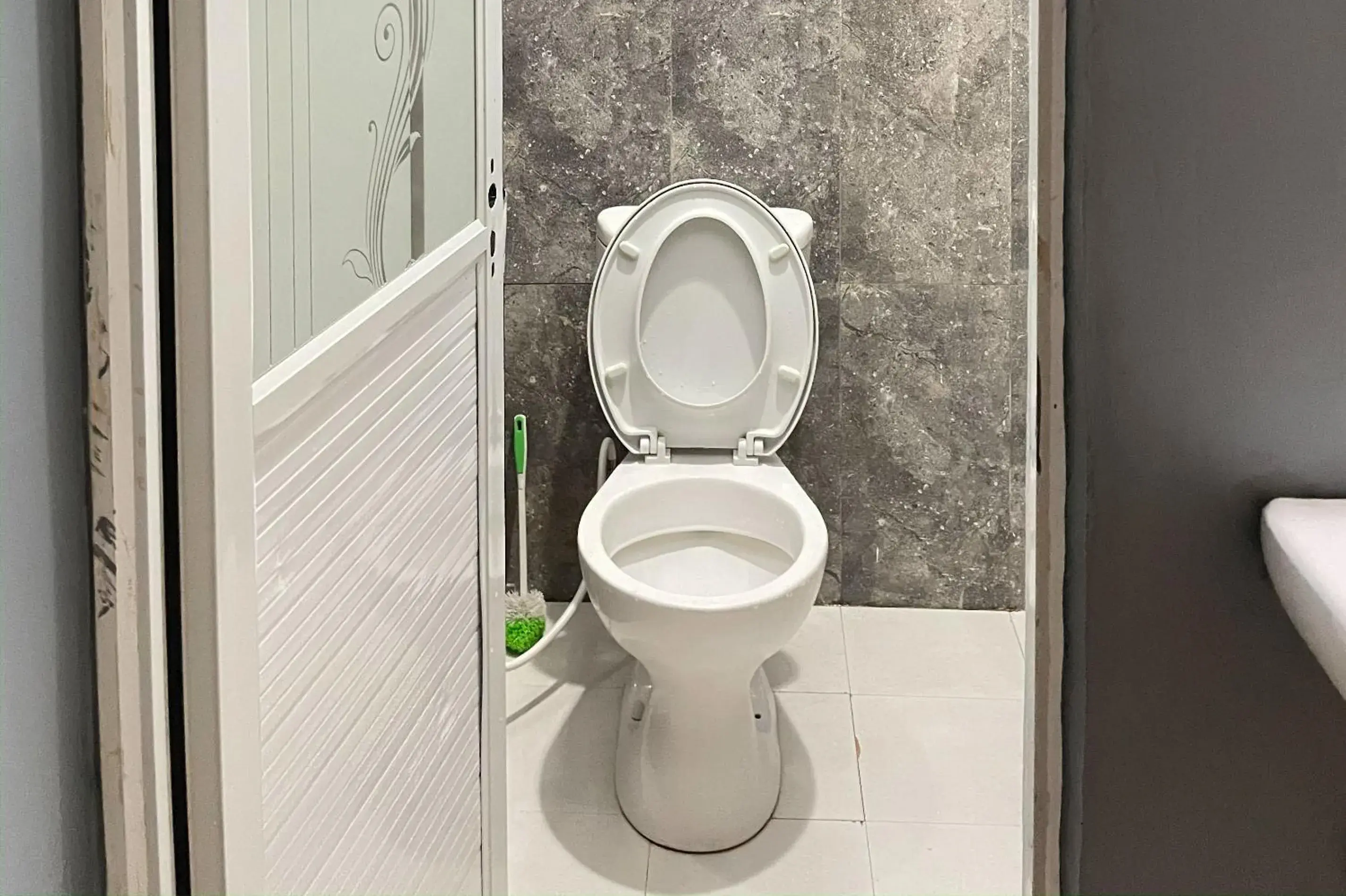 Bathroom in Almira Homestay Ambon Mitra RedDoorz Bathroom in Almira Homestay Ambon Mitra RedDoorz