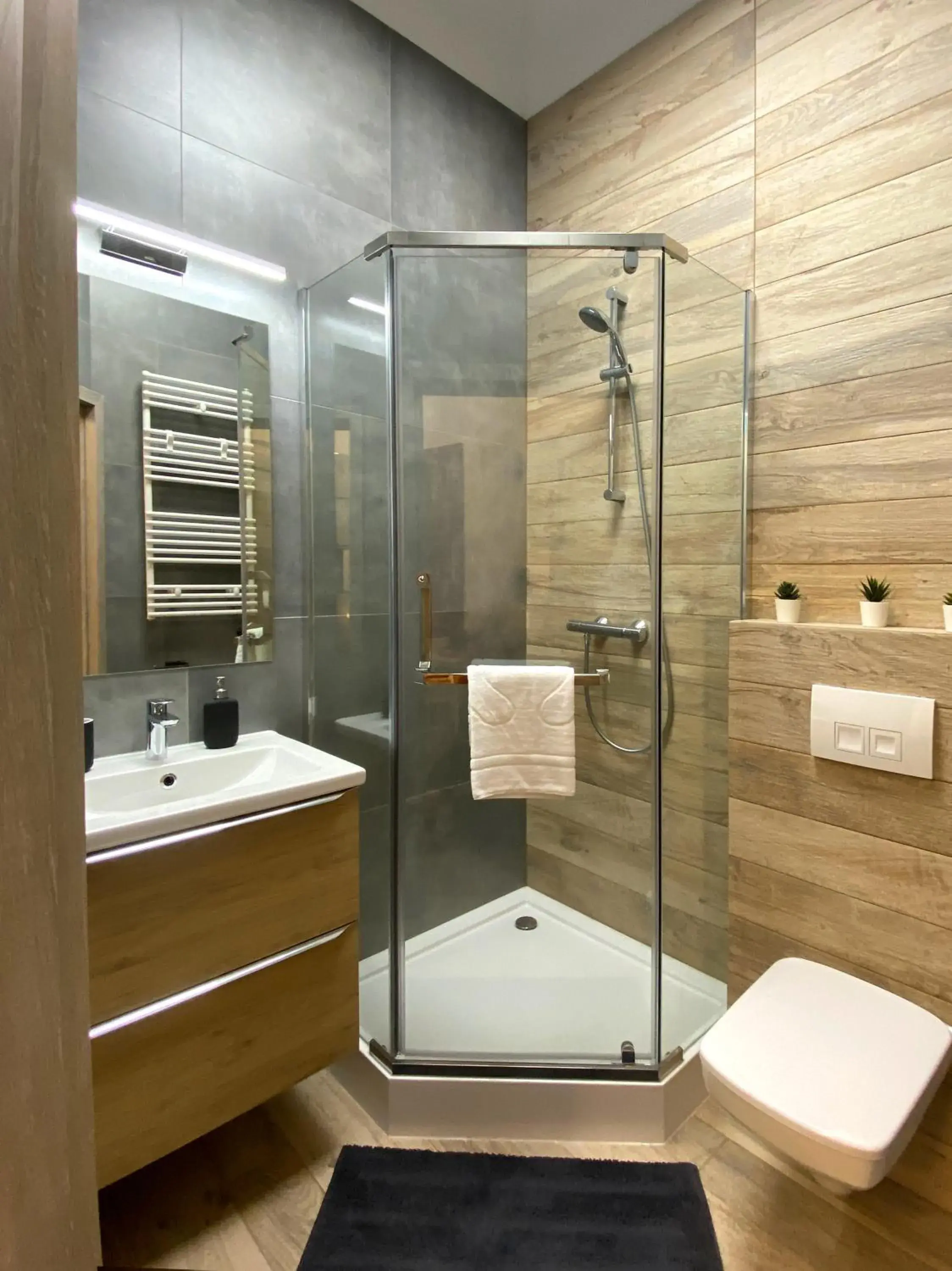 Bathroom in Starowiślna 41-43 by PI Apartments Bathroom in Starowiślna 41-43 by PI Apartments