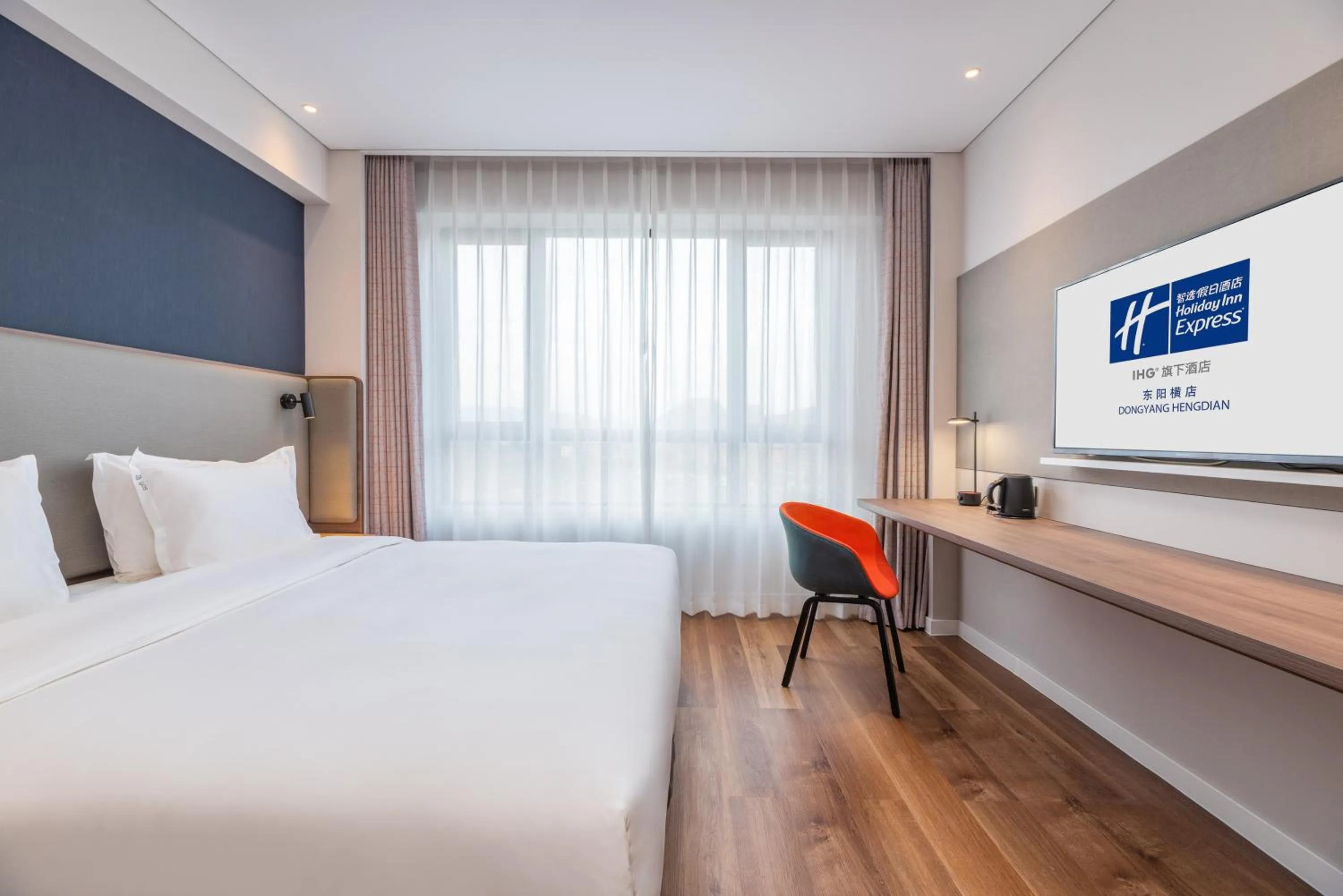 Bed in Holiday Inn Express Dongyang Hengdian, an IHG Hotel