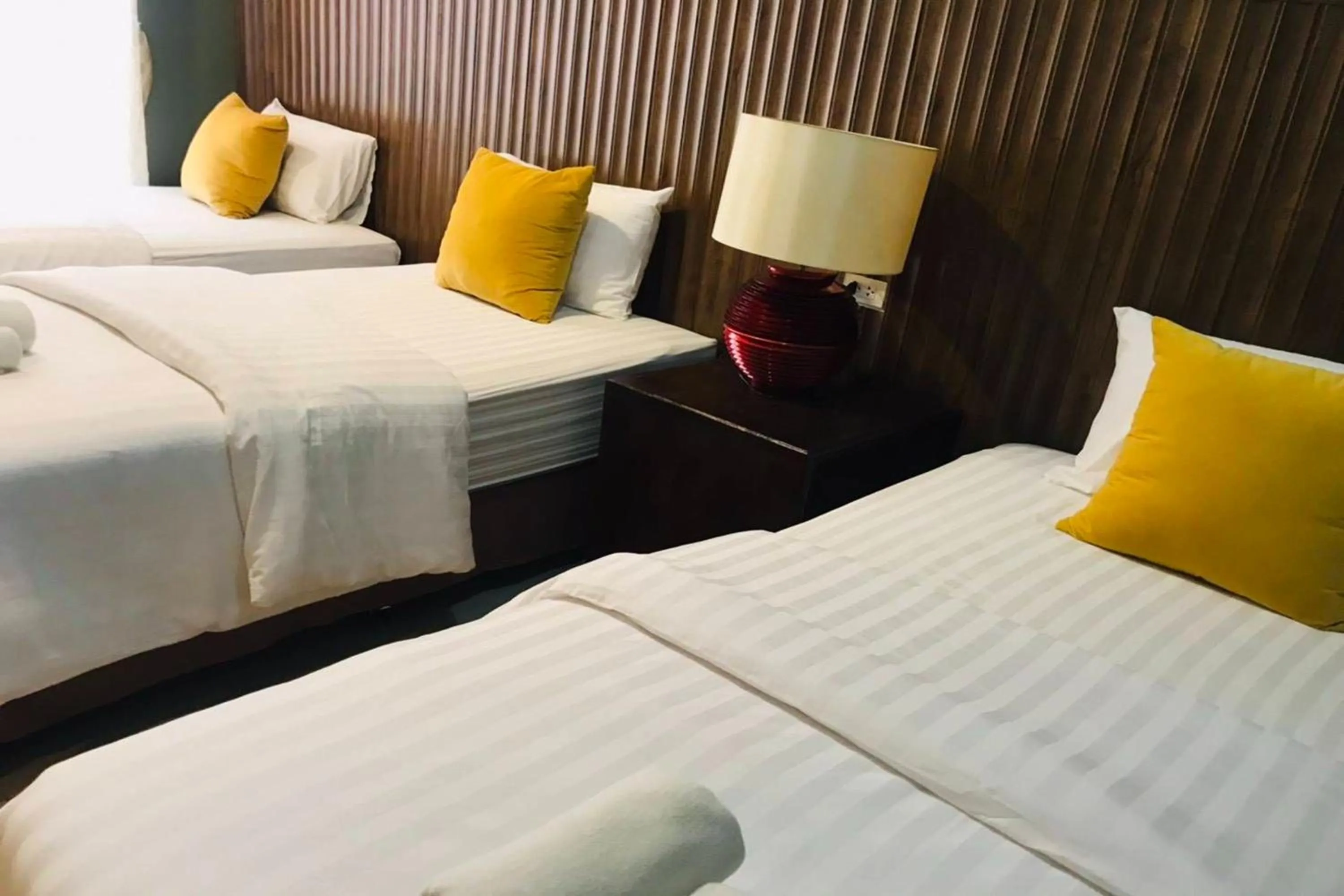 Bed in The Palm Hotel