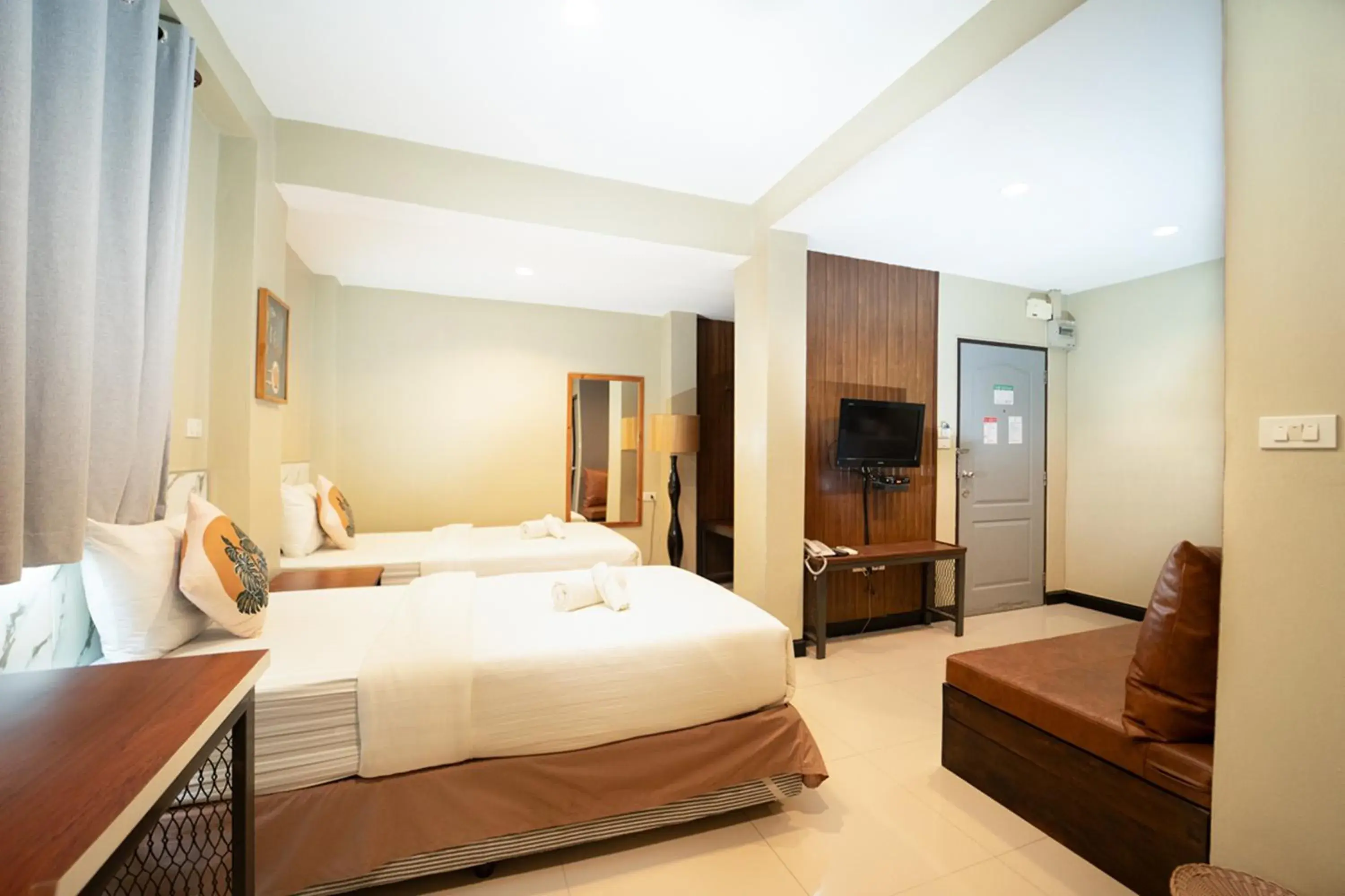 Bed in The Palm Hotel Bed in The Palm Hotel