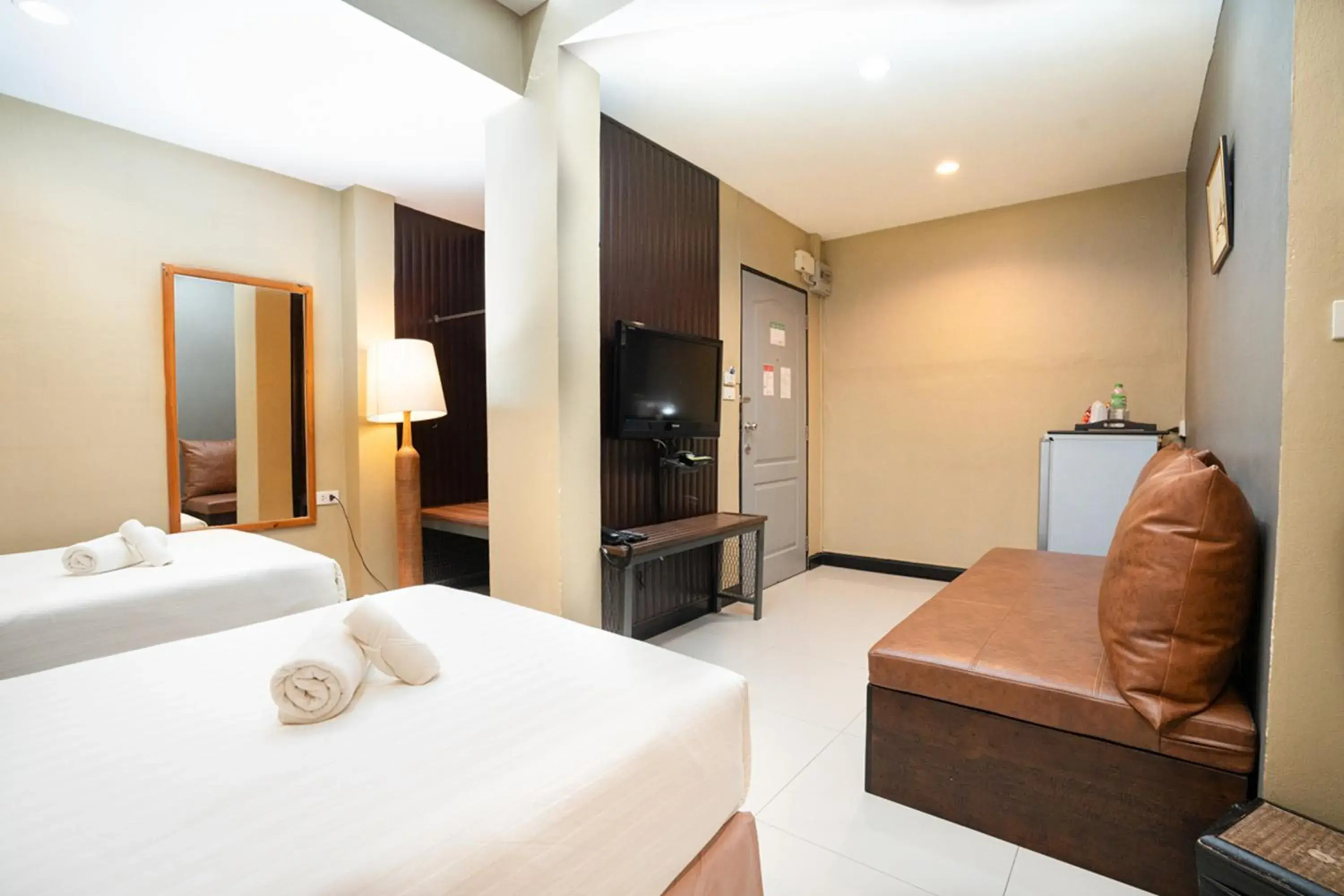 Bed in The Palm Hotel Bed in The Palm Hotel