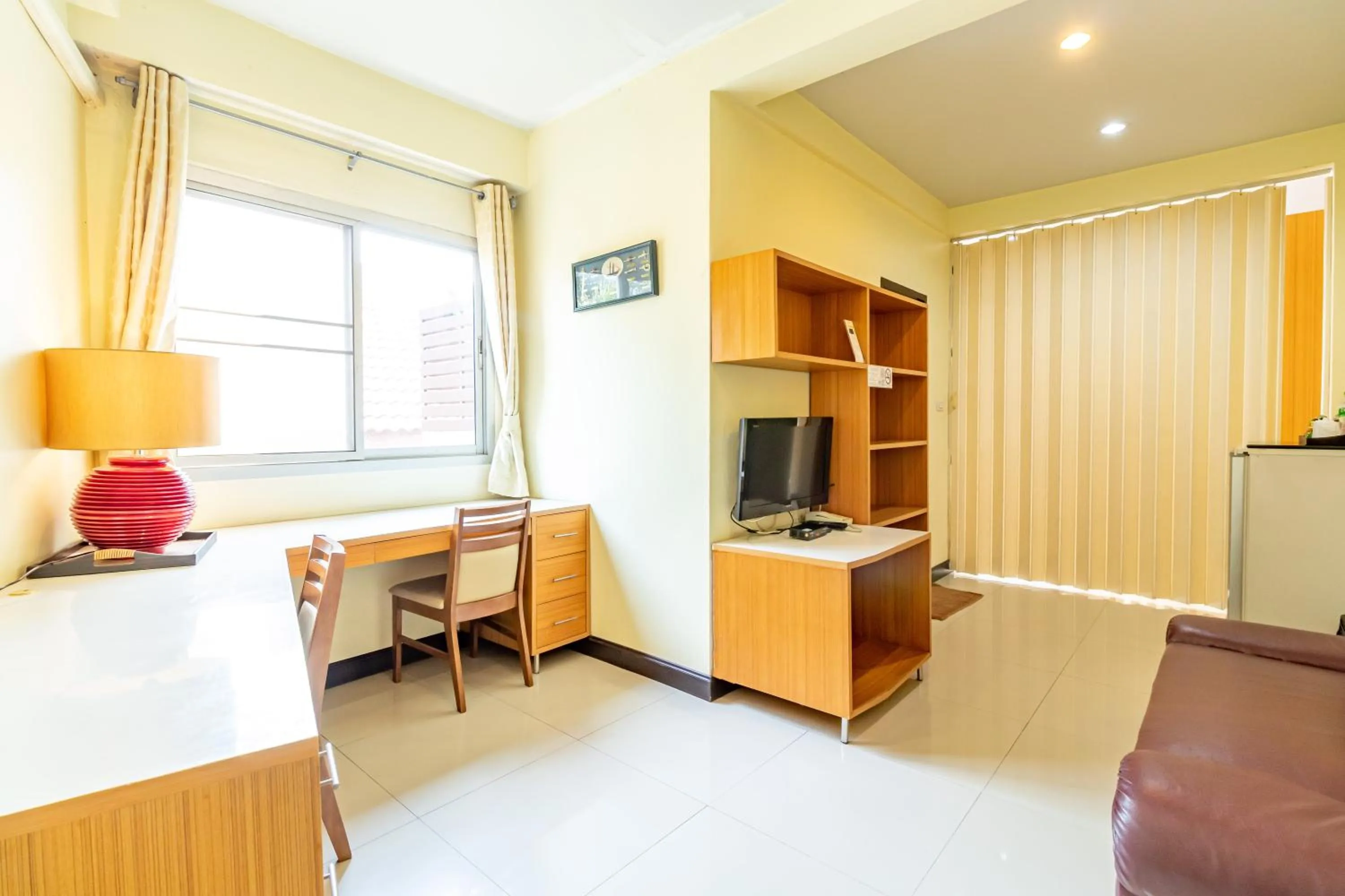 Bedroom in The Palm Hotel