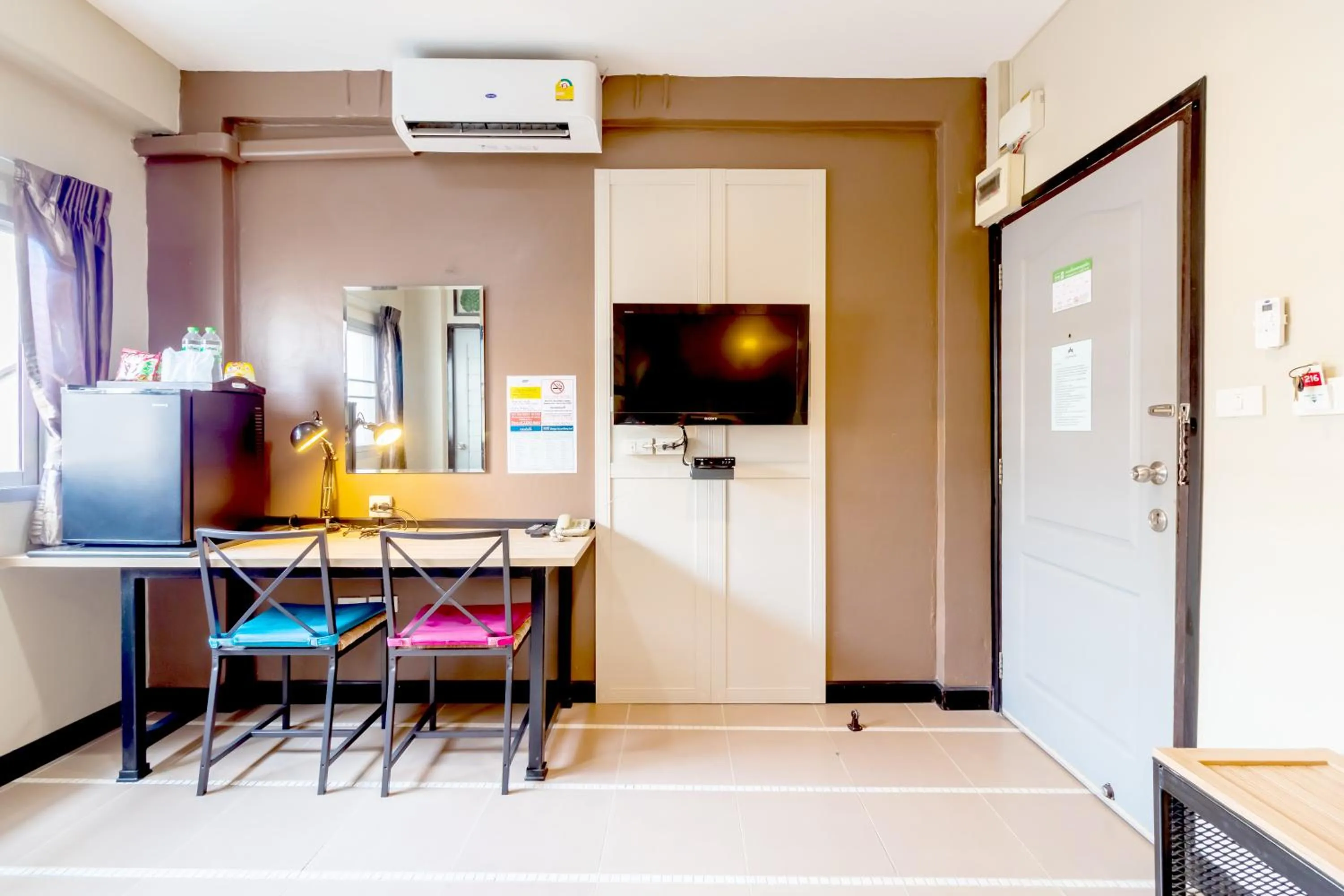 Bedroom in The Palm Hotel