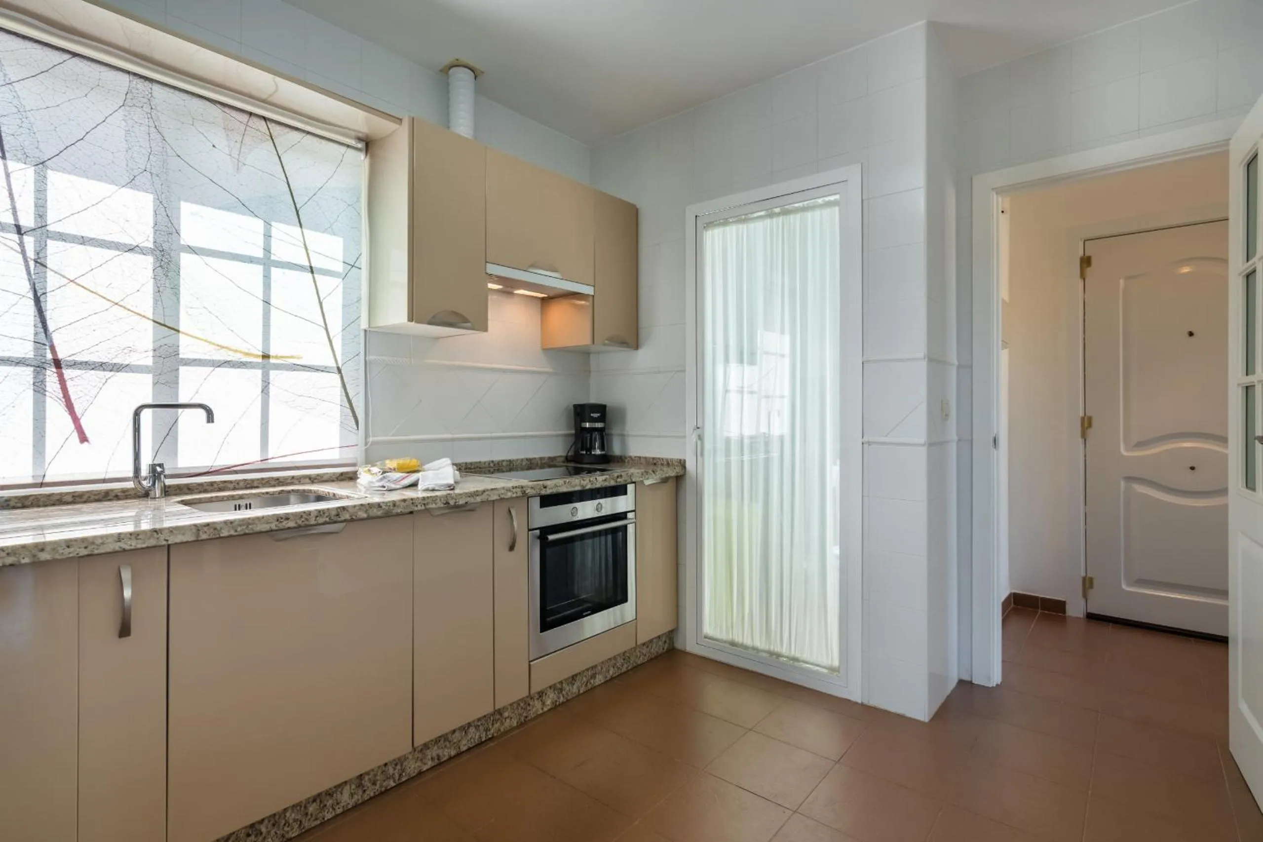 Kitchen or kitchenette in Albatros Golf I by Ĥ