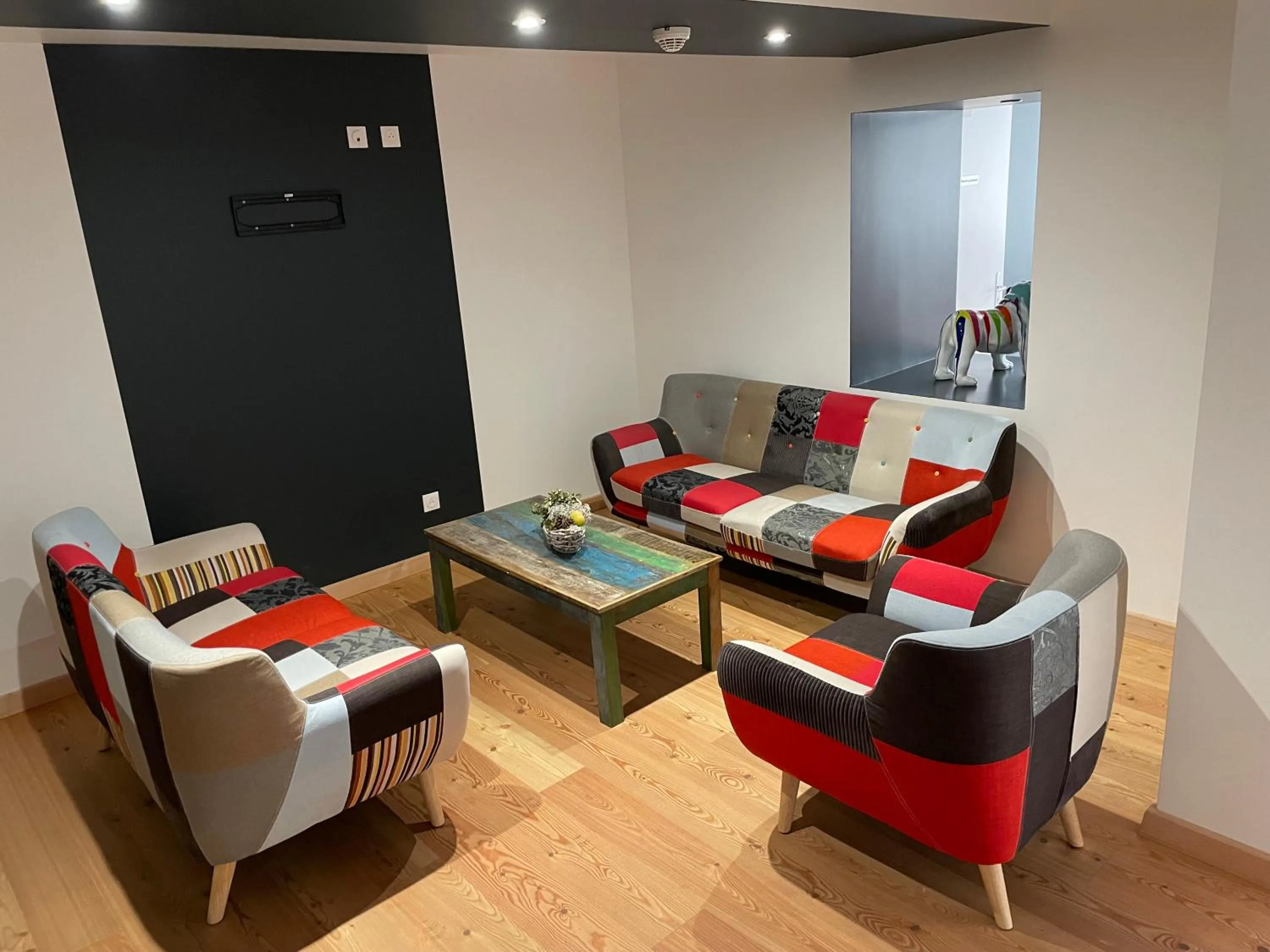 Communal lounge/ TV room in Hôtel & Spa du Tremplin