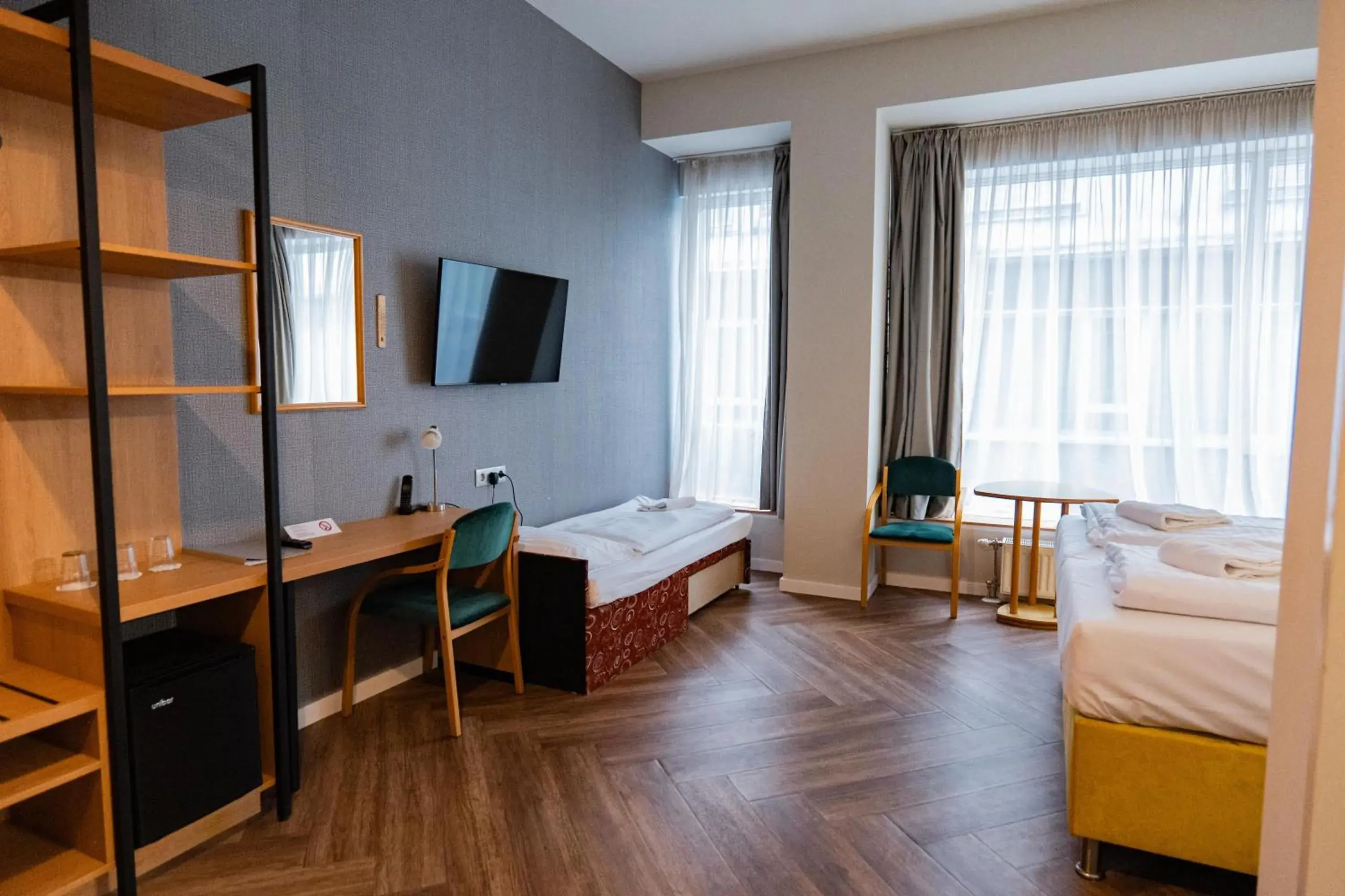 Communal lounge/ TV room, Bed in Pilvax Hotel Budapest Communal lounge/ TV room, Bed in Pilvax Hotel Budapest