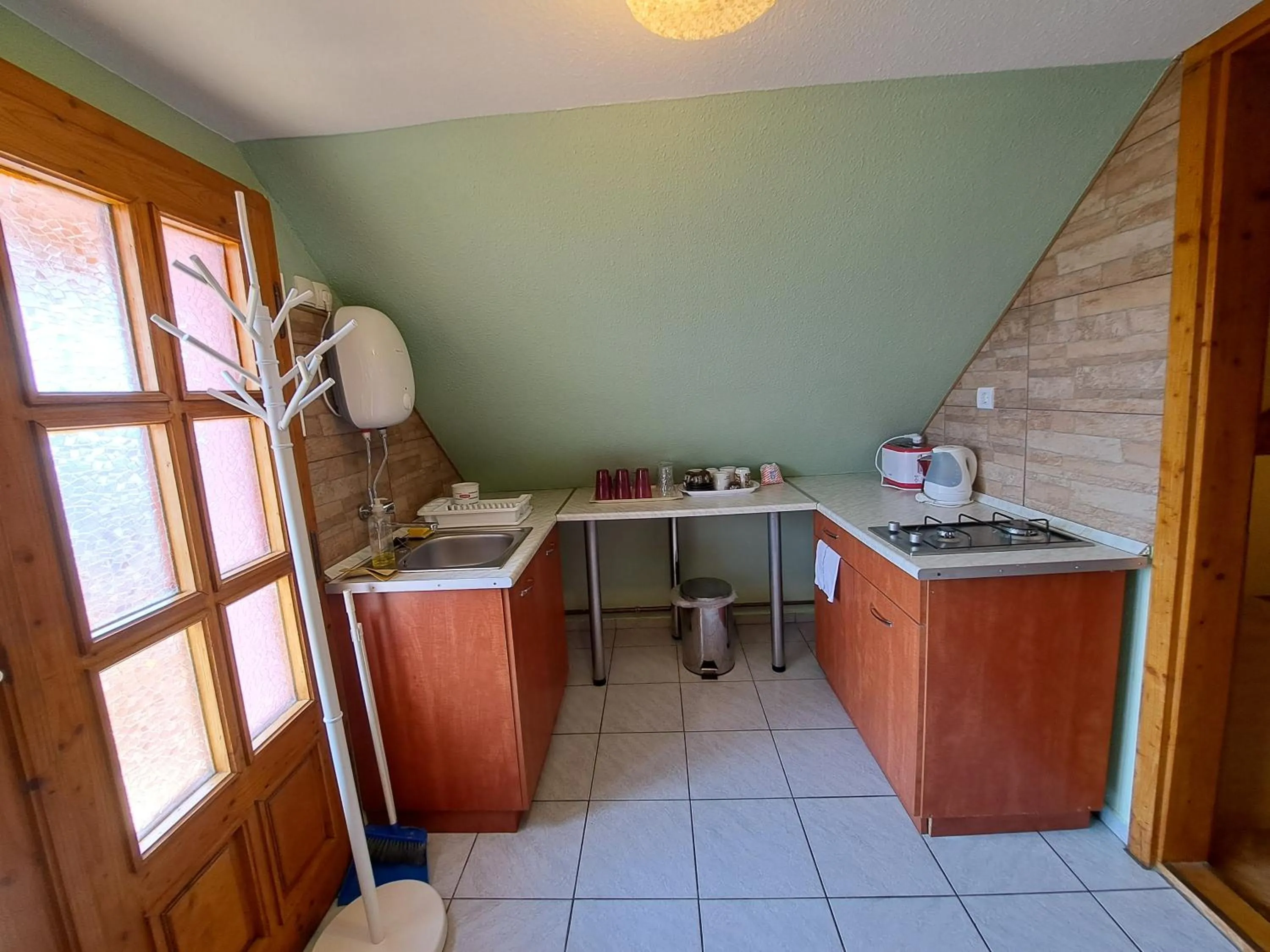 kitchen in Pink Tulip Apartment House