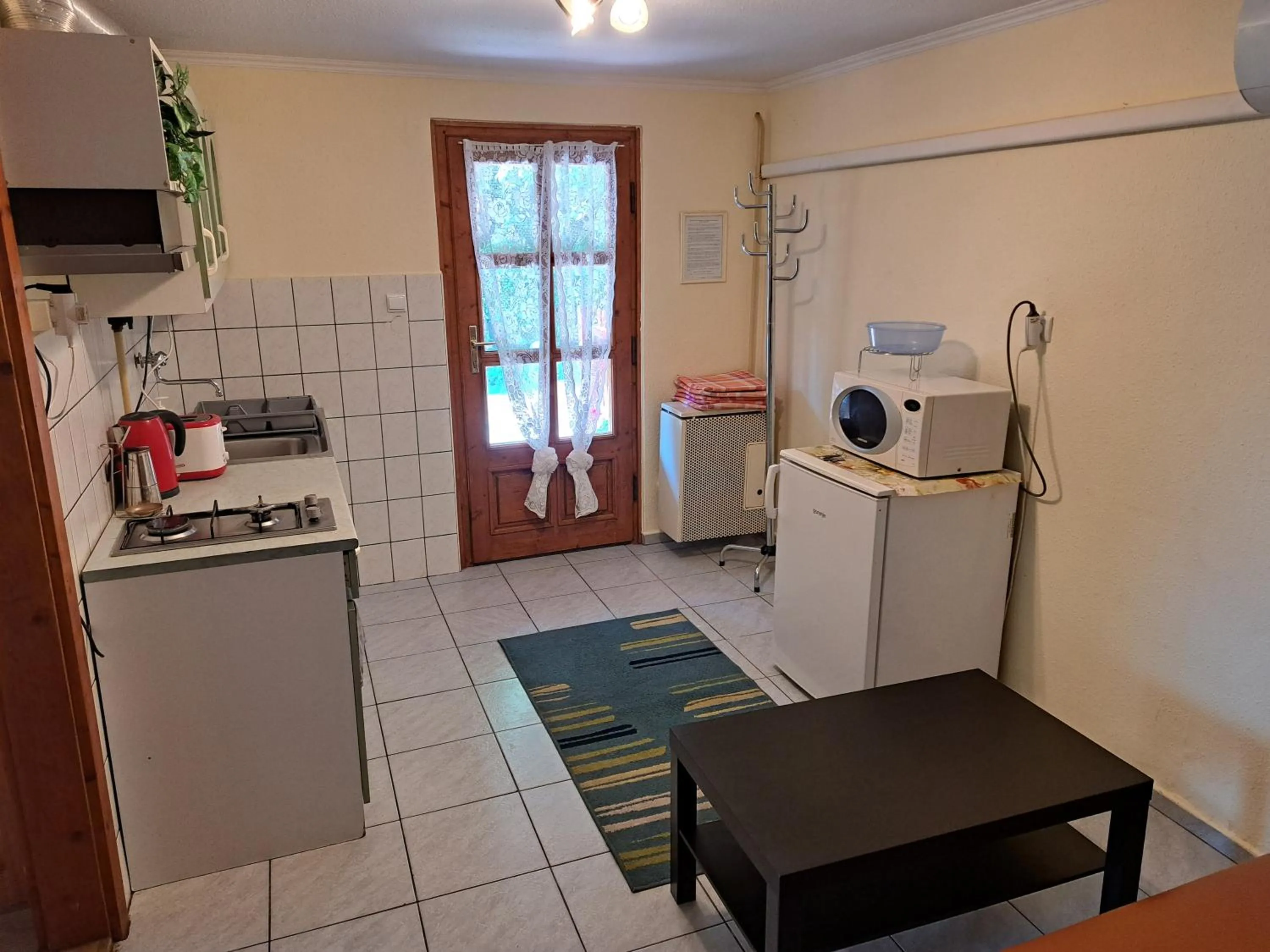Kitchen or kitchenette in Pink Tulip Apartment House