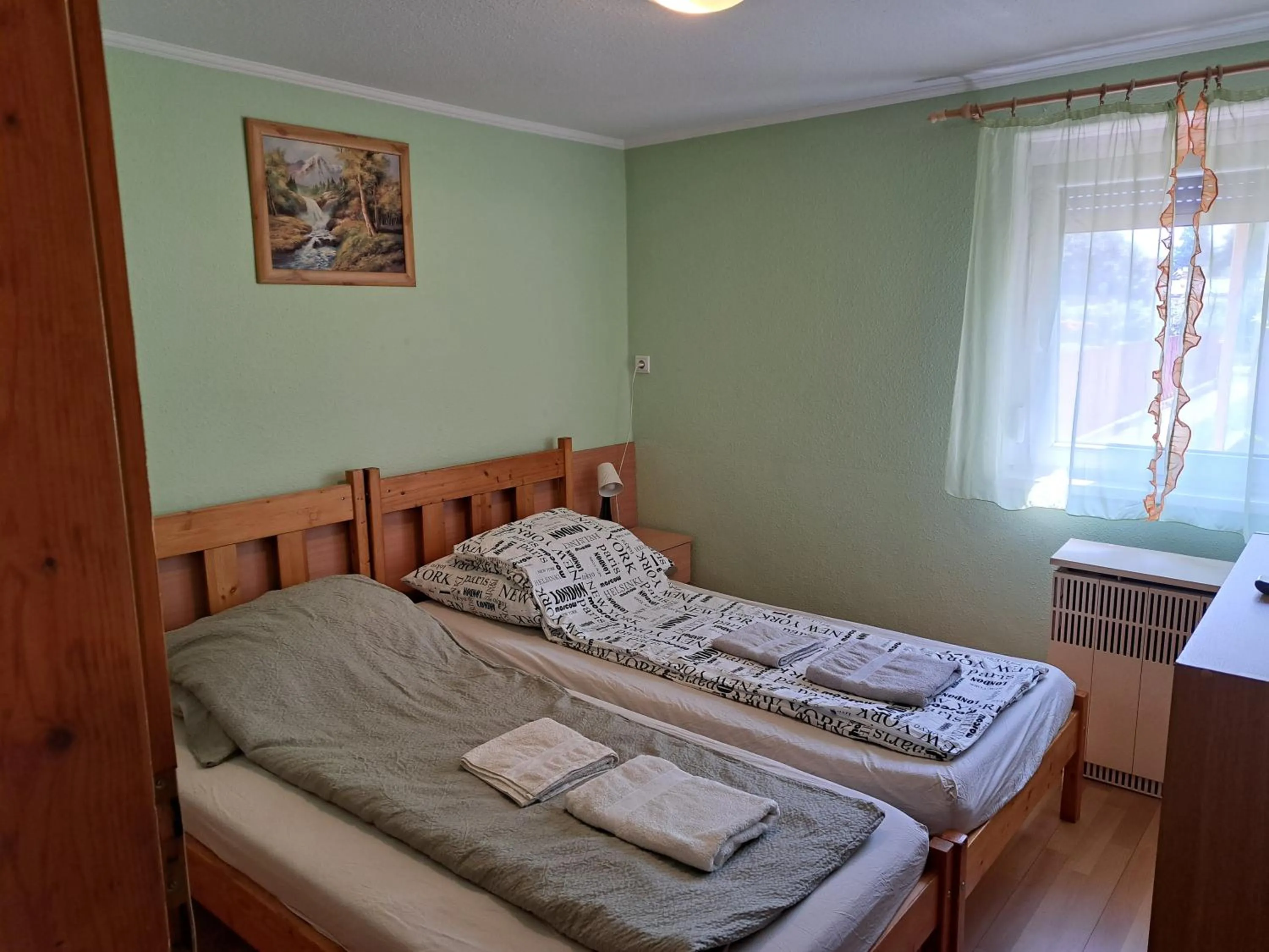 Bedroom, Bed in Pink Tulip Apartment House